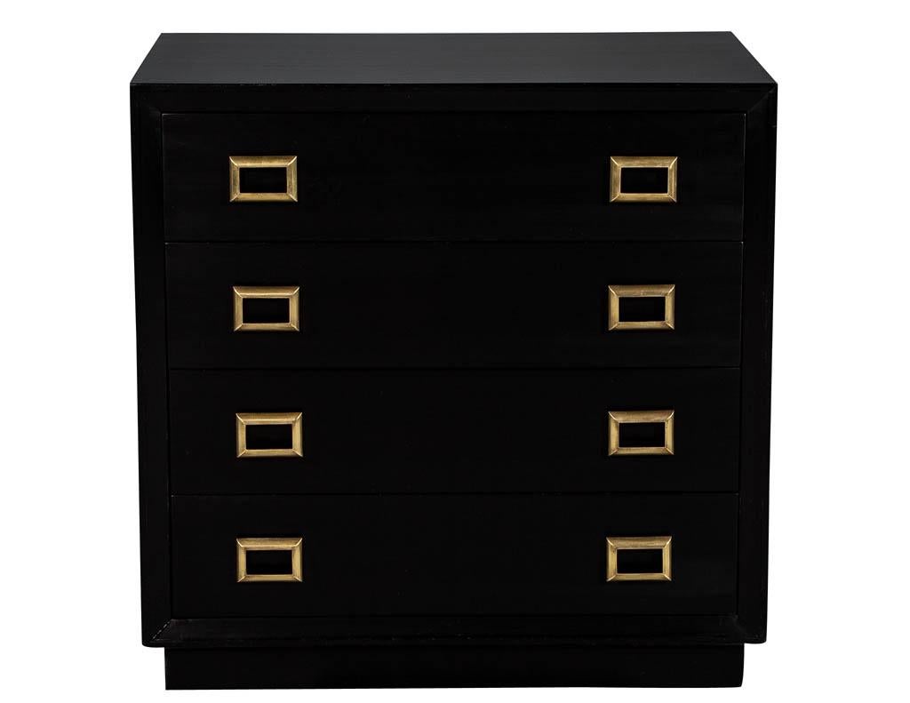 Vintage classic contemporary style chest of drawers. Finished in a hand polished black lacquer that intensifies the classic clean lines of this piece and highlighted with the original square brass oriental inspired hardware. This piece is made with