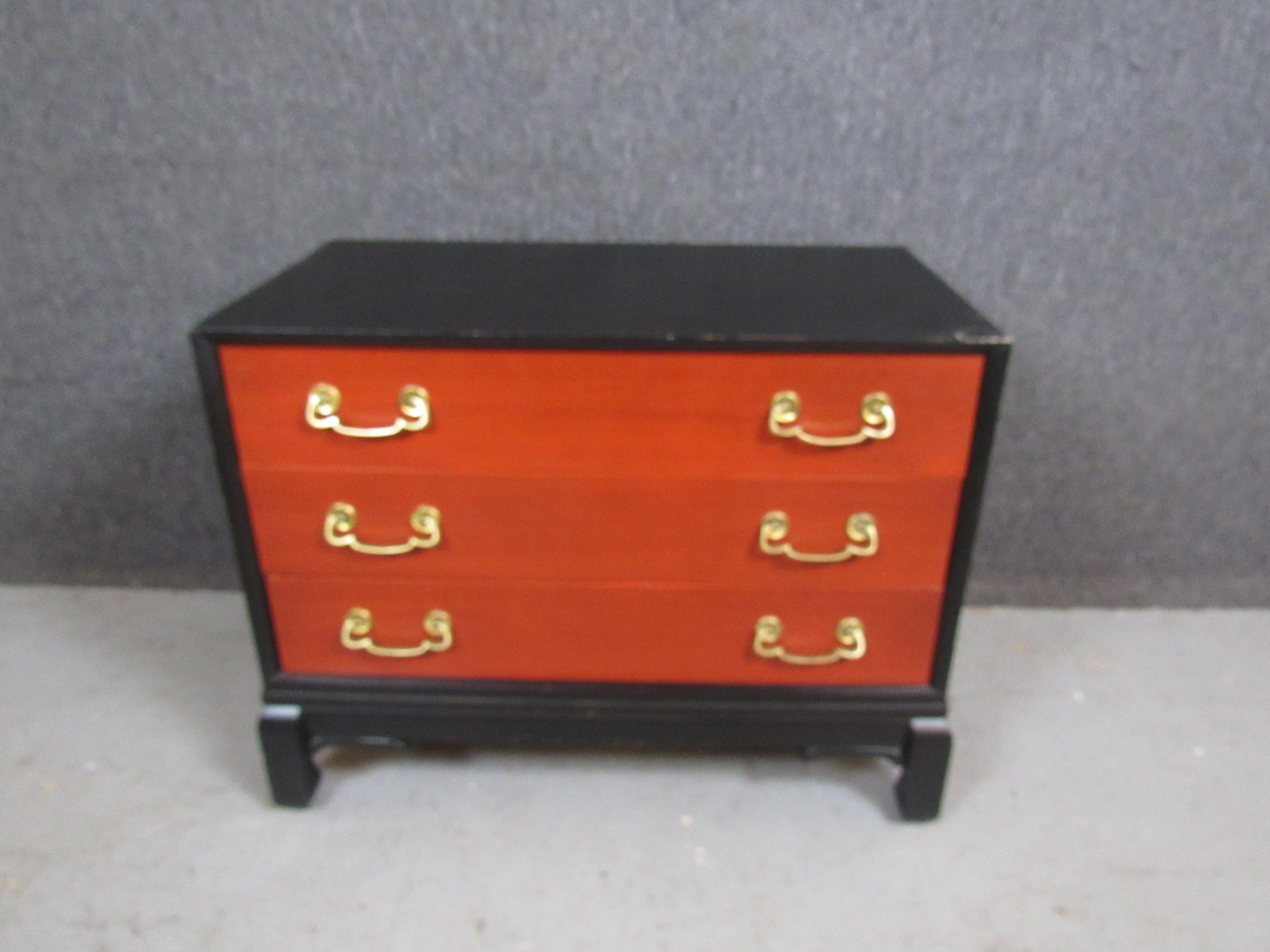 Fantastic mid-century Chinoiserie/Tansu chest combining eastern aesthetic influences with western construction & craftsmanship.  Taking plentiful nods from Michael Taylor's Far East collection for Baker Furniture, this ebonized case piece is sure to