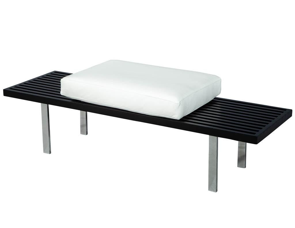 Vintage ebonized George Nelson style bench with leather seat. Restored by the Carrocel professionals in a satin black lacquer finish with new white Italian leather. The stainless steel legs are original with very minor wear consistent with age.