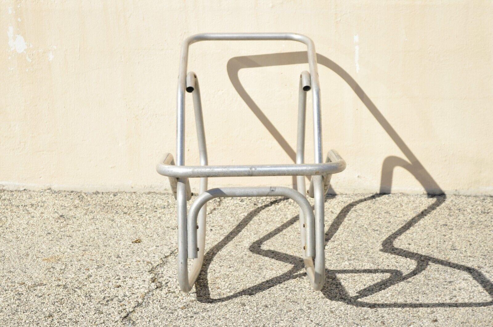 Vintage Edgar Bartolucci for Barwa Aluminum Frame Rocking Pool Chaise Lounge Chair -Single. Item featured is designed by Edgar Bartolucci for Barwa, aluminum metal rocking frames, clean modernist lines, sleek sculptural form. Circa 1950.