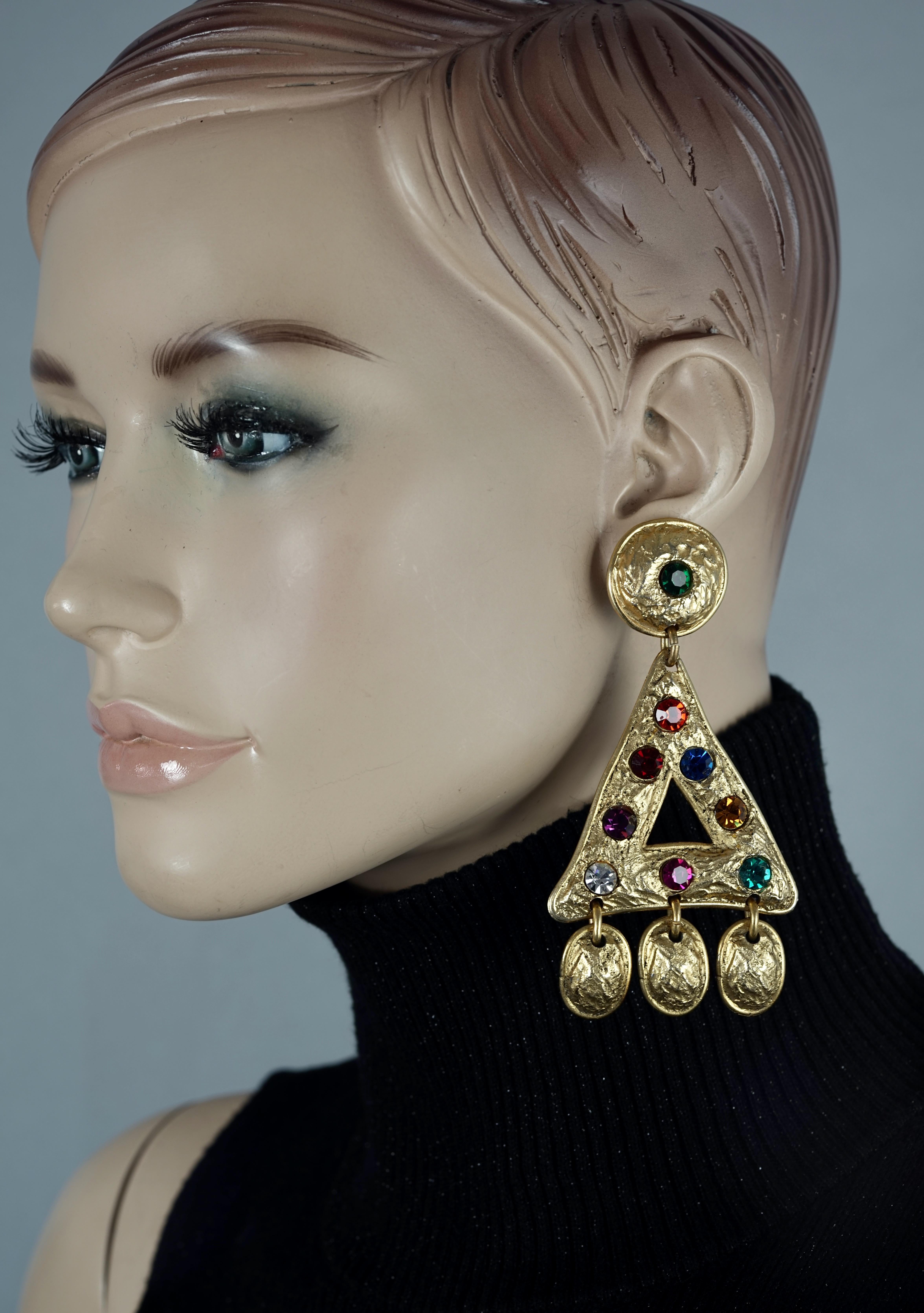 Vintage EDOUARD RAMBAUD Byzantine Hammered Geometric Rhinestone Earrings

Measurements:
Height: 3.94 inches (10 cm)
Width: 2.16 inches (5.5 cm)
Weight: 38 grams

Features:
- 100% Authentic EDOUARD RAMBAUD.
- Massive hammered geometric earrings