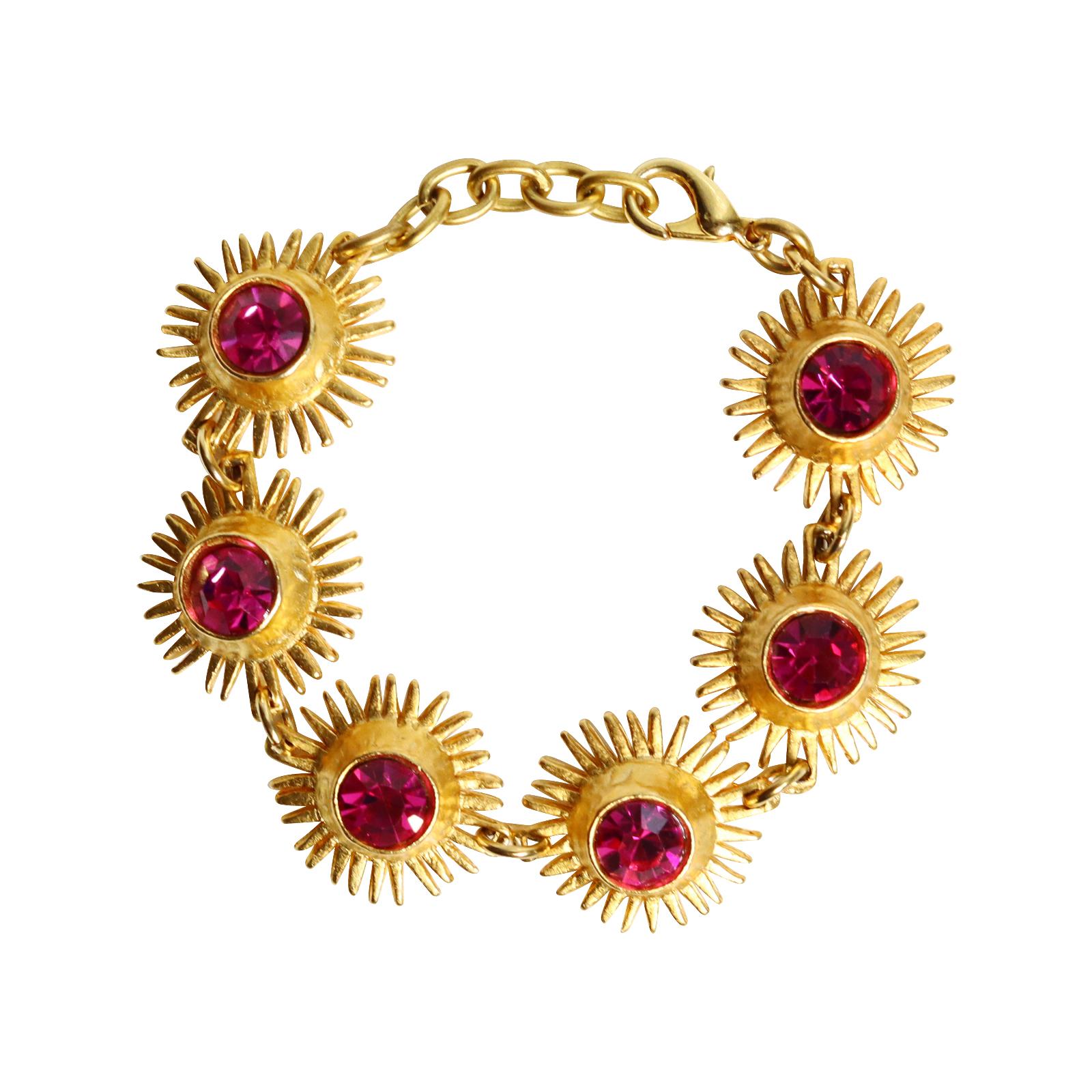 Bracciale d'epoca Edouard Rambaud con pietre rosa dorate.   Sembrano piccoli raggi di sole con cristalli rosa.  Ti fa sorridere solo a guardarlo.   Collana con cristalli trasparenti. Da 7 