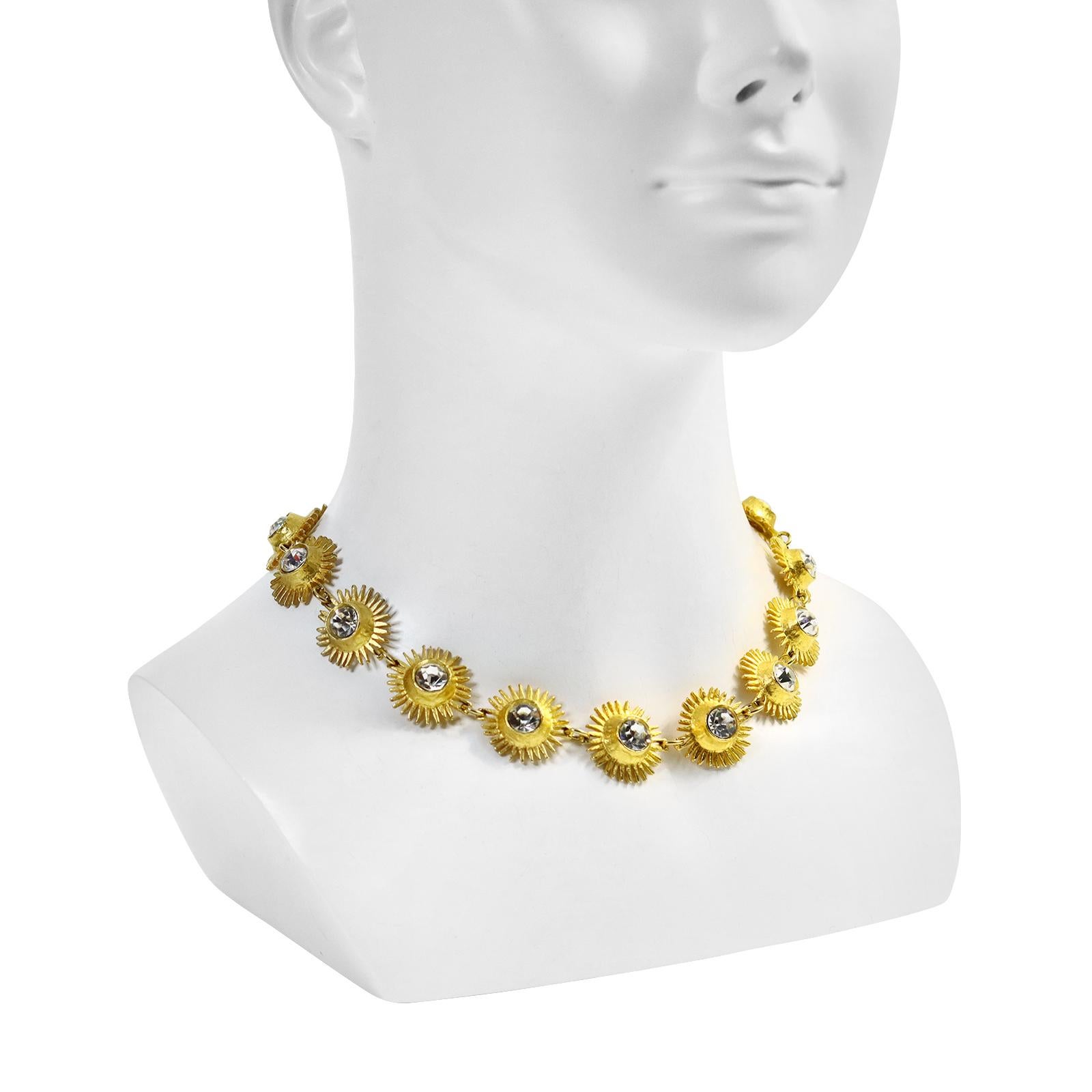 Vintage Edouard Rambaud Gold Necklace with Crystals. Has round discs that look like suns or sunflowers with a crystal in each one.  They are each signed underneath.  Necklace is 17