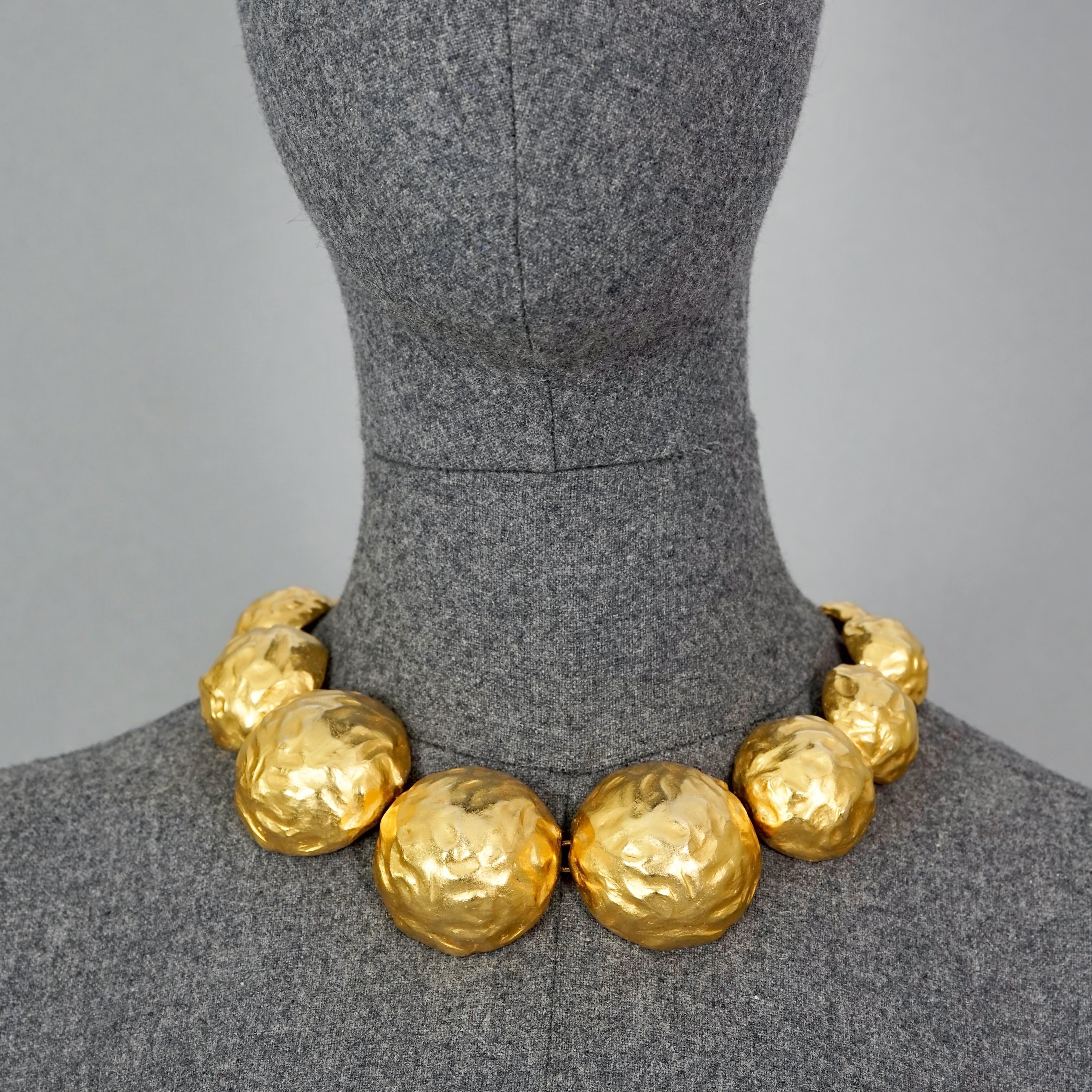 Vintage EDOUARD RAMBAUD Hammered Demi Sphere Link Necklace

Measurements:
Height: 17.71 inches (45 m)
Wearable Length: 14.56 inches to 16.92 cm (37 cm to 43 cm) adjustable

Features:
- 100% Authentic EDOUARD RAMBAUD.
- Hammered demi sphere link