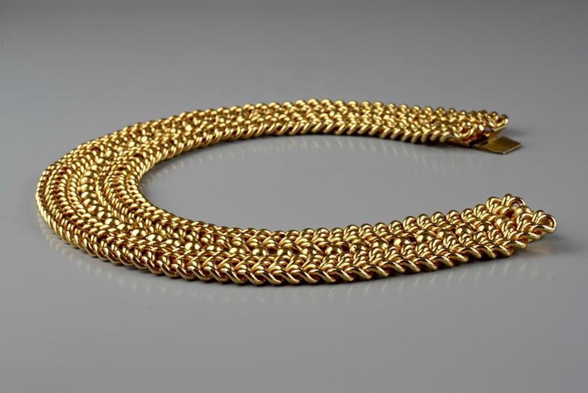 Vintage EDOUARD RAMBAUD Wide Chain Choker Necklace

Measurements:
Height: 1.38 inches (3.5 cm)
Wearable Length: 16.93 inches (43 cm)

Features:
- 100% Authentic EDOUARD RAMBAUD.
- Wide chain choker necklace.
- Signed EDOUARD RAMBAUD Paris.
- Gold