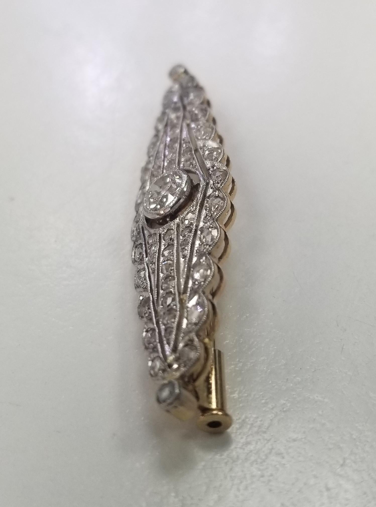  Vintage Edwardian 18k yellow Gold European and Rose Cut Diamond Brooch
Specifications:
    main stone: 1 European cut diamond approx. .50pts.   
    diamonds: 52 Rose Cut diamonds approx. .65pts.
    carat total weight: 1.15cts.
    color: G
   