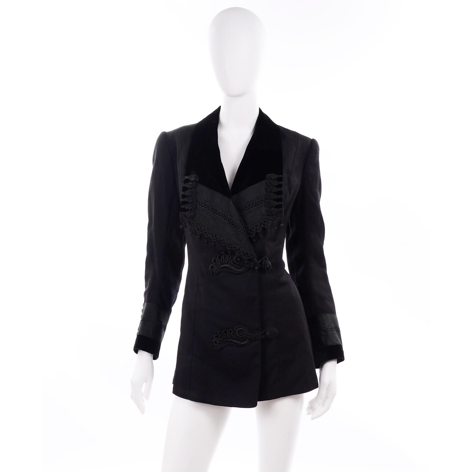 This is a really wonderful vintage Edwardian black wool jacket with tassels and beautiful braiding. This outstanding vintage jacket is fully lined in silk and closes with two knitted buttons. There is black velvet trim is on cuffs and lapels. Jean