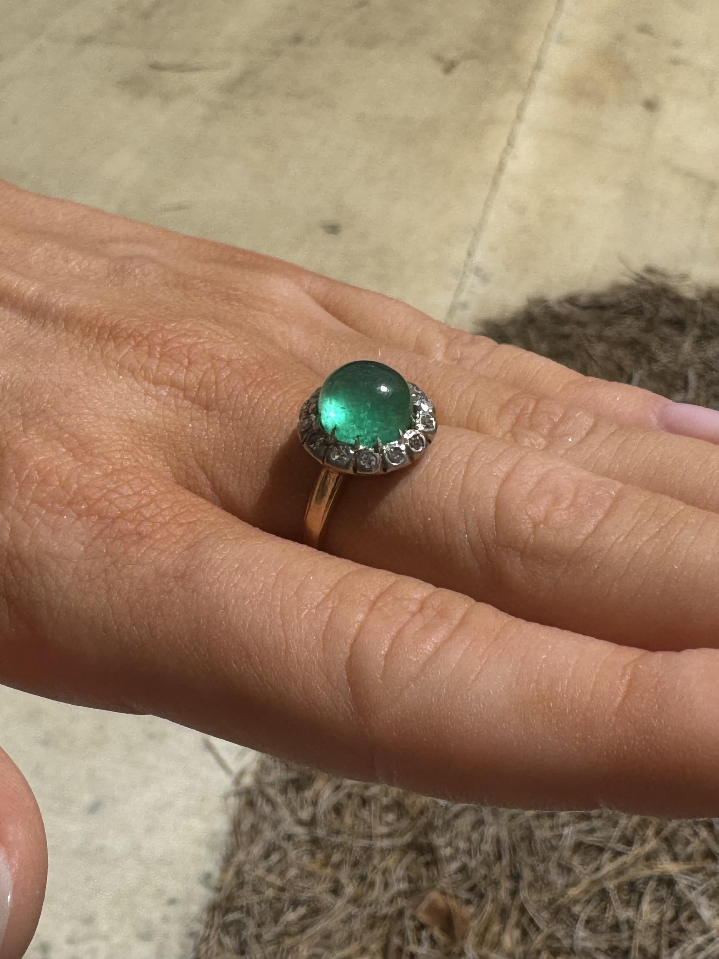 We are thrilled to offer this vintage beauty!!
We love cabochon cut gemstones.
They just seem to always glow and show off the natural beauty of the gem.

Ring Details
Material: 14K Yellow & White Gold
Era: Edwardian Era 1900 - 1910
Head Height: