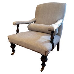Fauteuil de bibliothèque anglais de style édouardien vintage sur roulettes avec têtes de clous