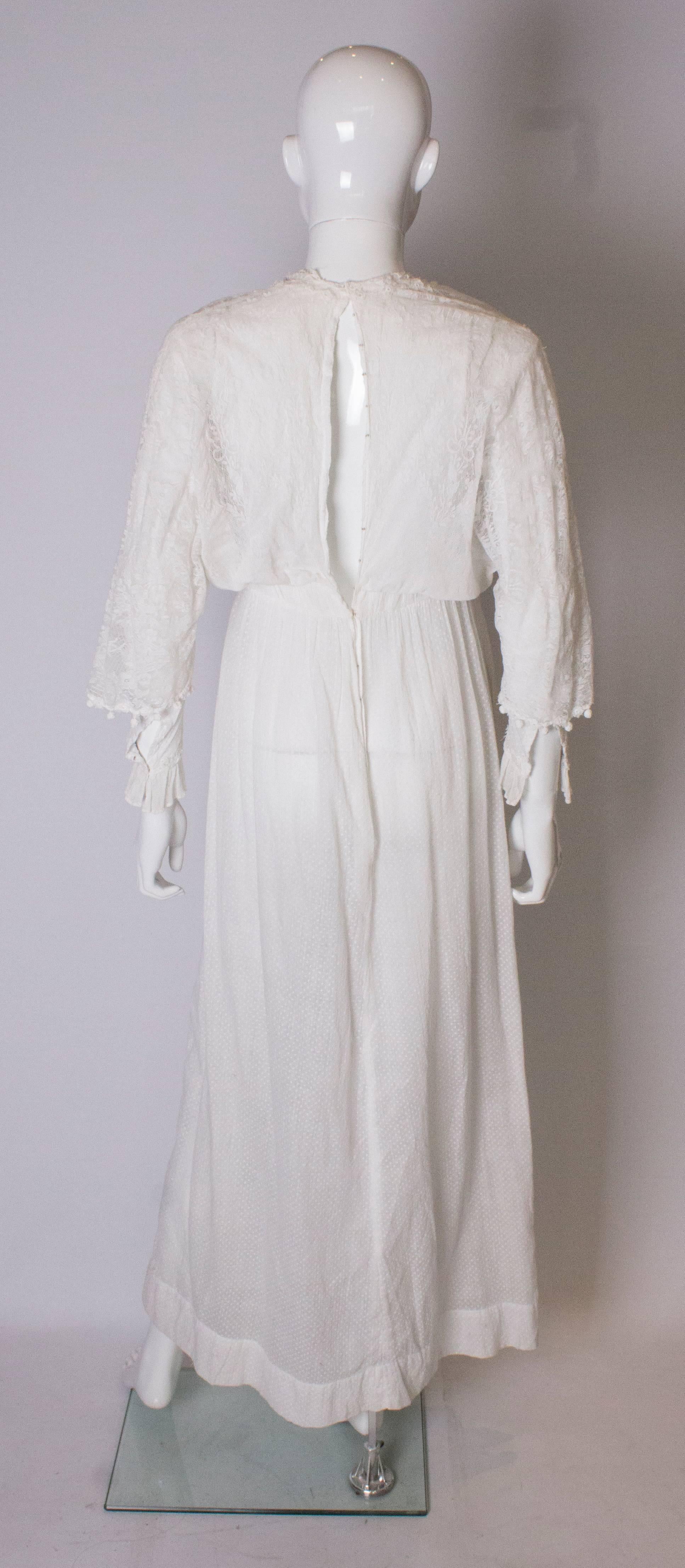 A vintage Edwardian white cotton lawn dress with lace detail  1