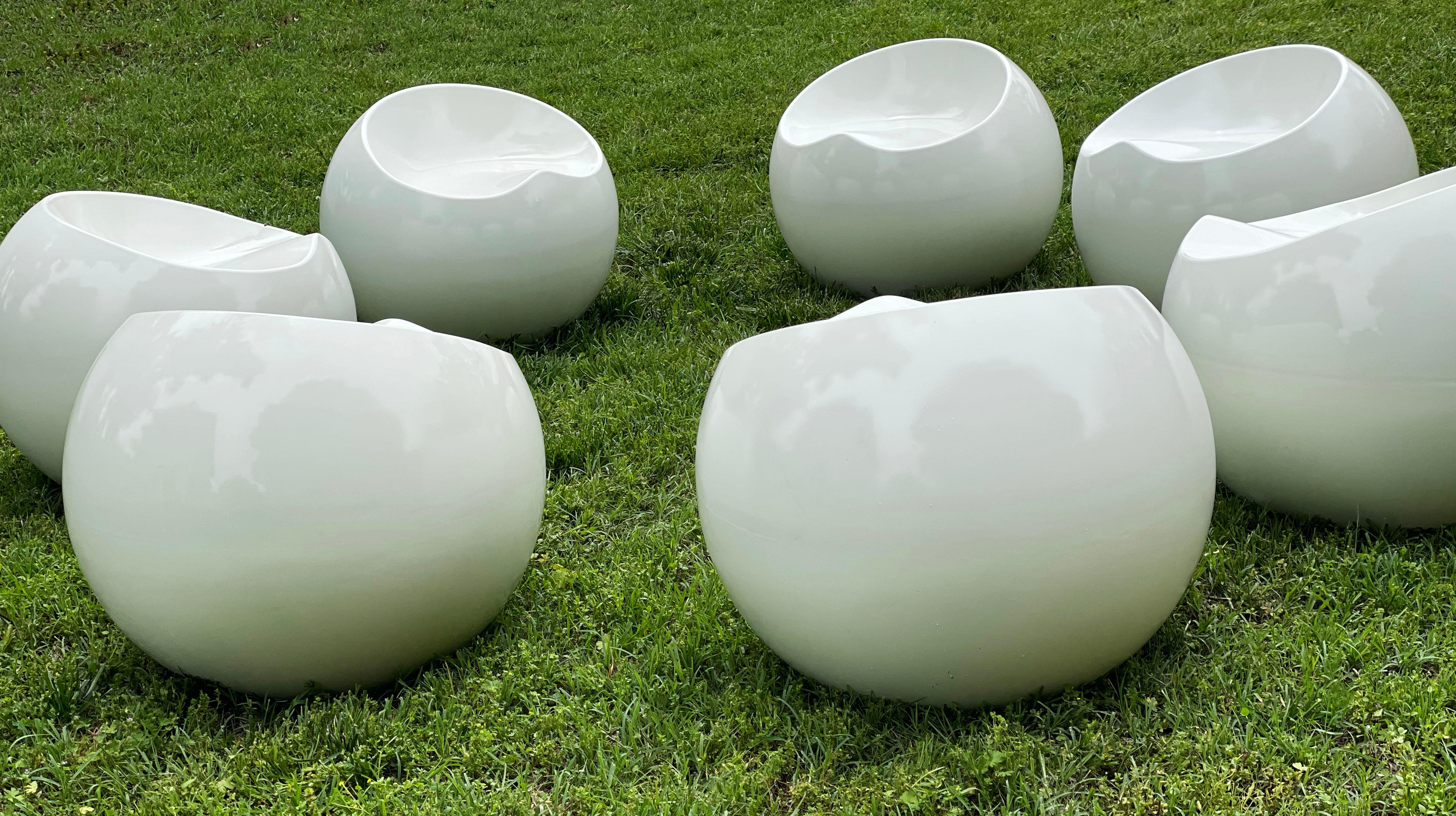 Vintage indoor outdoor ball seats - inspired by Eero Aarnio ball chair and Conceived by Irish sculptor and designer Finn Stone for XL Boom. The 'Ball Chair' offers a playful and comfortable seating solution. Suitable for both indoor and outdoor