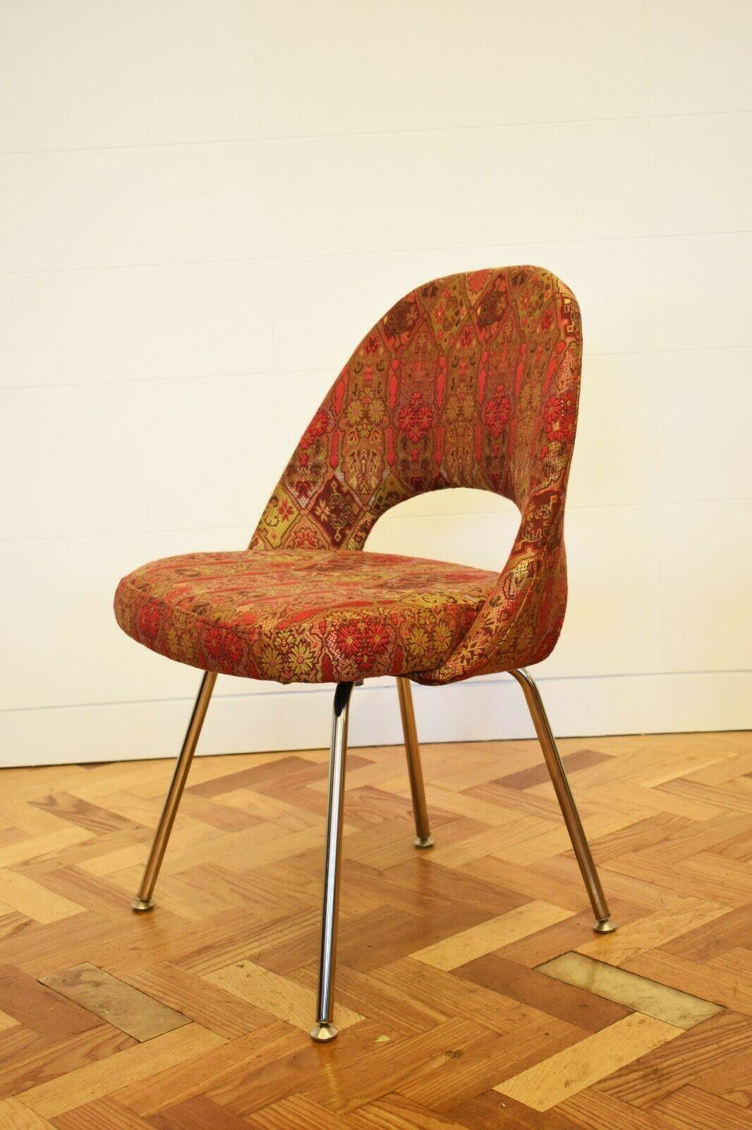 Vintage Eero Saarinen Conference chair for Knoll International

Set upon metal legs, this chair has been upholstered in a beautiful custom brocade fabric. 

An iconic design by Eero Saarinen first introduced in 1957, this style of chair