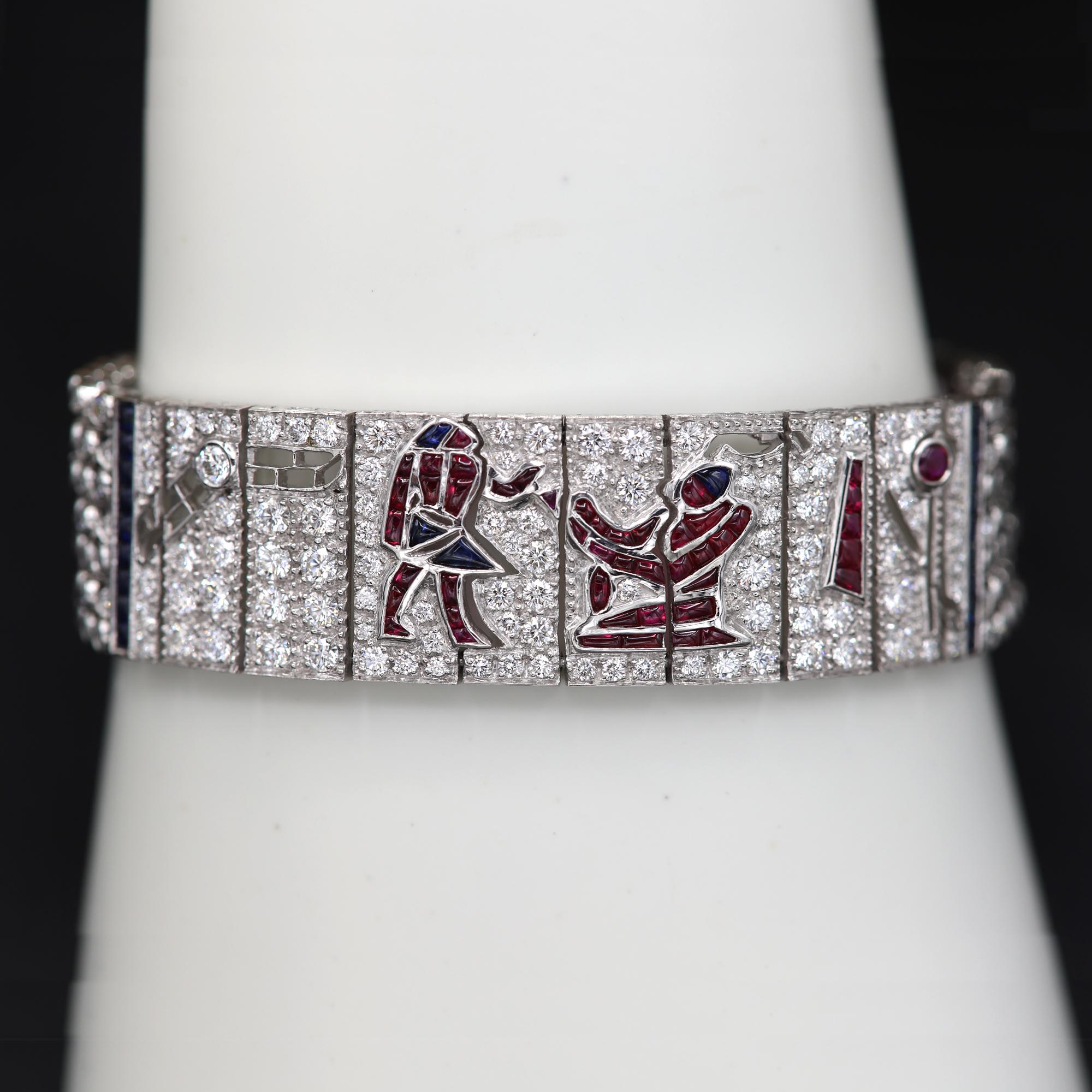 Egyptian Art Replica Bracelet- made from Platinum.
Diamonds, Blue Sapphire, Ruby & Emerald.
Total Diamonds 8.10 carat G-VS
Total color gemstones 9.07 carat.
Weight of bracelet is 64 grams
New, however was made over 20 years ago and was put away in a