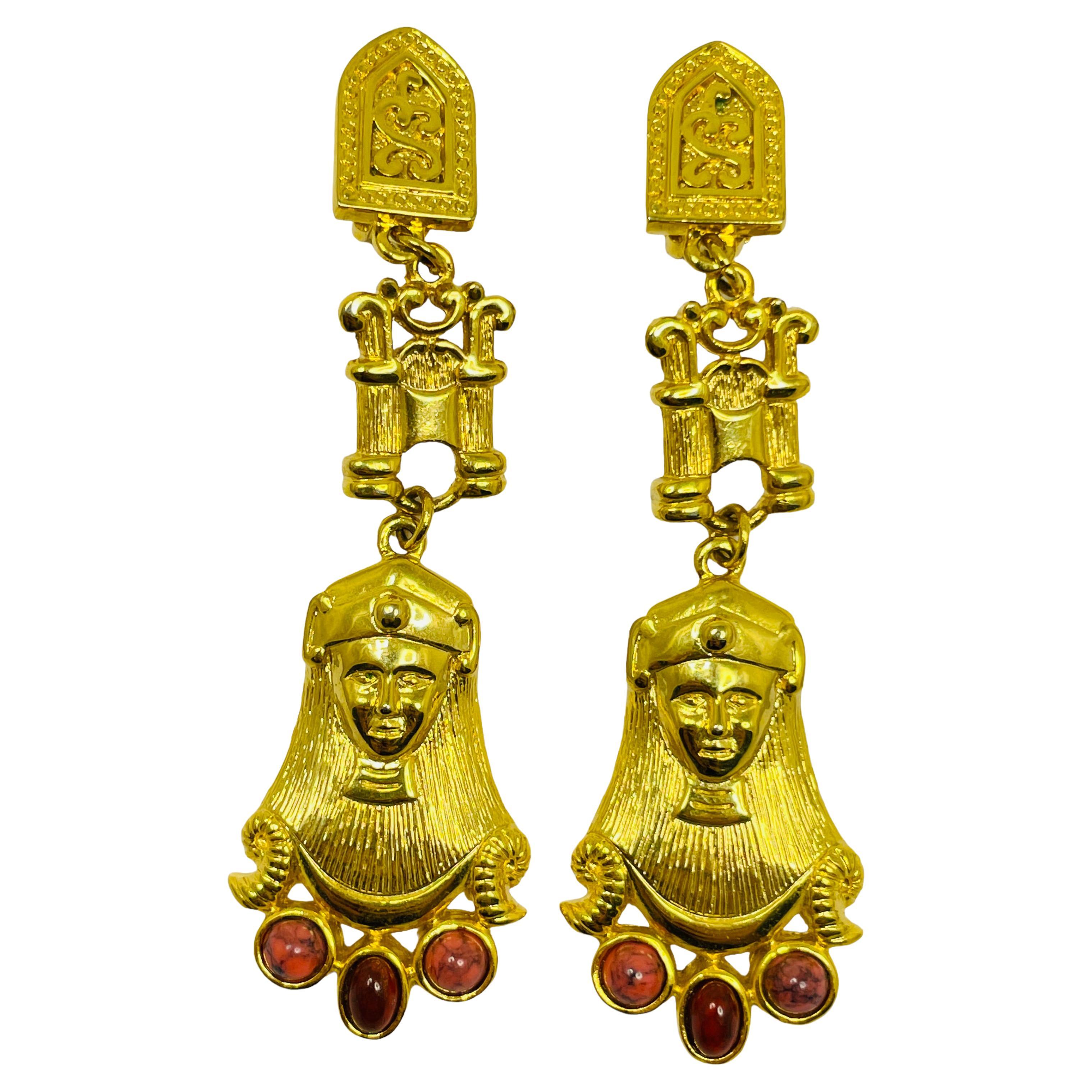 Vintage Egyptian gold dangle designer runway clip on earrings For Sale