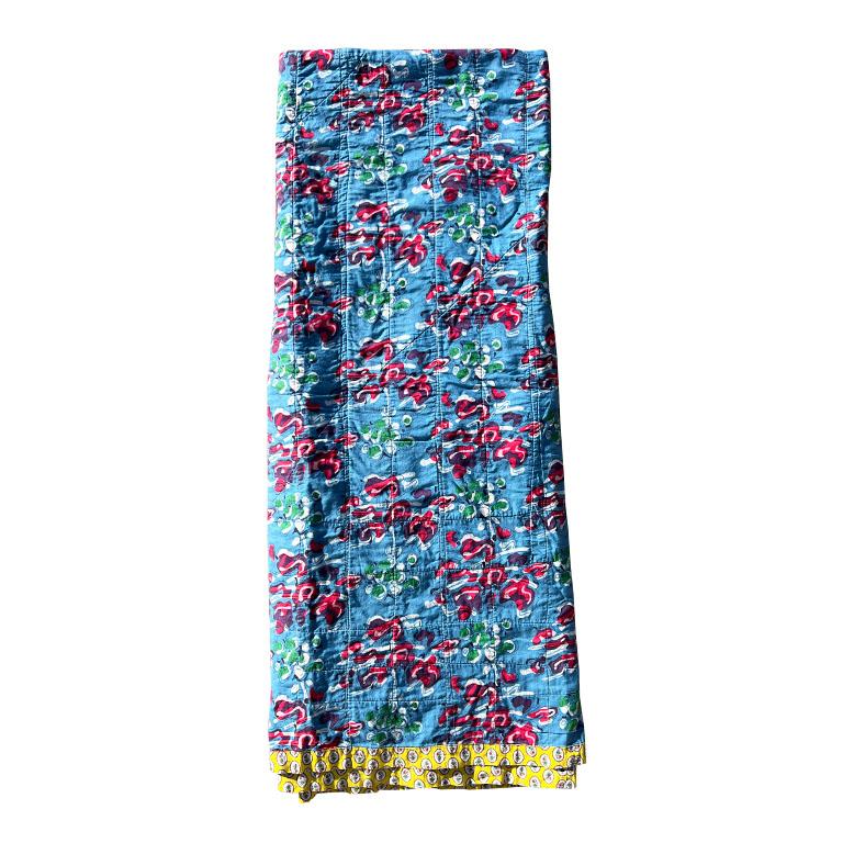 A bright colorful Matelasse Egyptian coverlet or throw. This piece has an interesting story. In the 1960s, an Oklahoma man who was an oil and gas engineer for Phillips Petroleum was transferred to Egypt just before the oil boom. As an expat, he