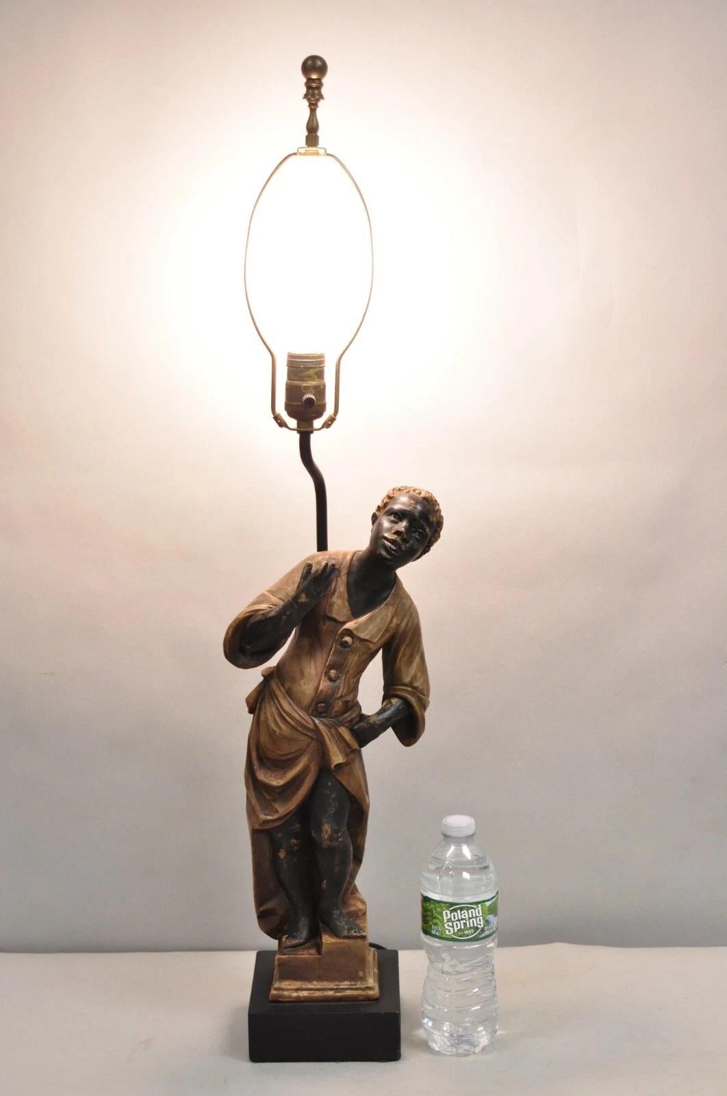 Vintage Egyptian Moorish Style Resin Blackamoor Sculpture Figure Table Lamp on Wooden Base. Circa Late 20th Century. Measurements: 32.5