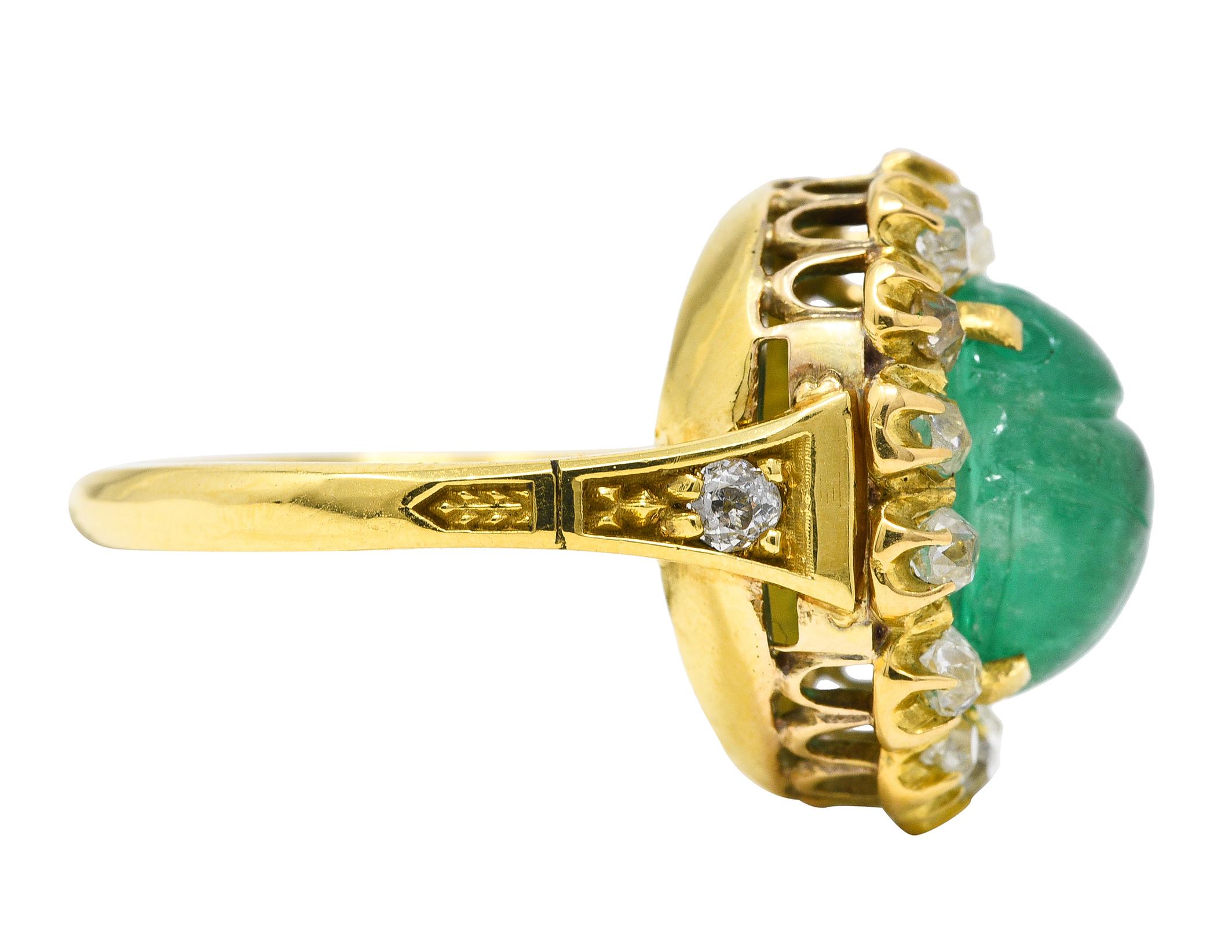 Oval Cut Vintage Egyptian Revival 7.80 Carats Carved Emerald Diamond 18 Karat Ring For Sale
