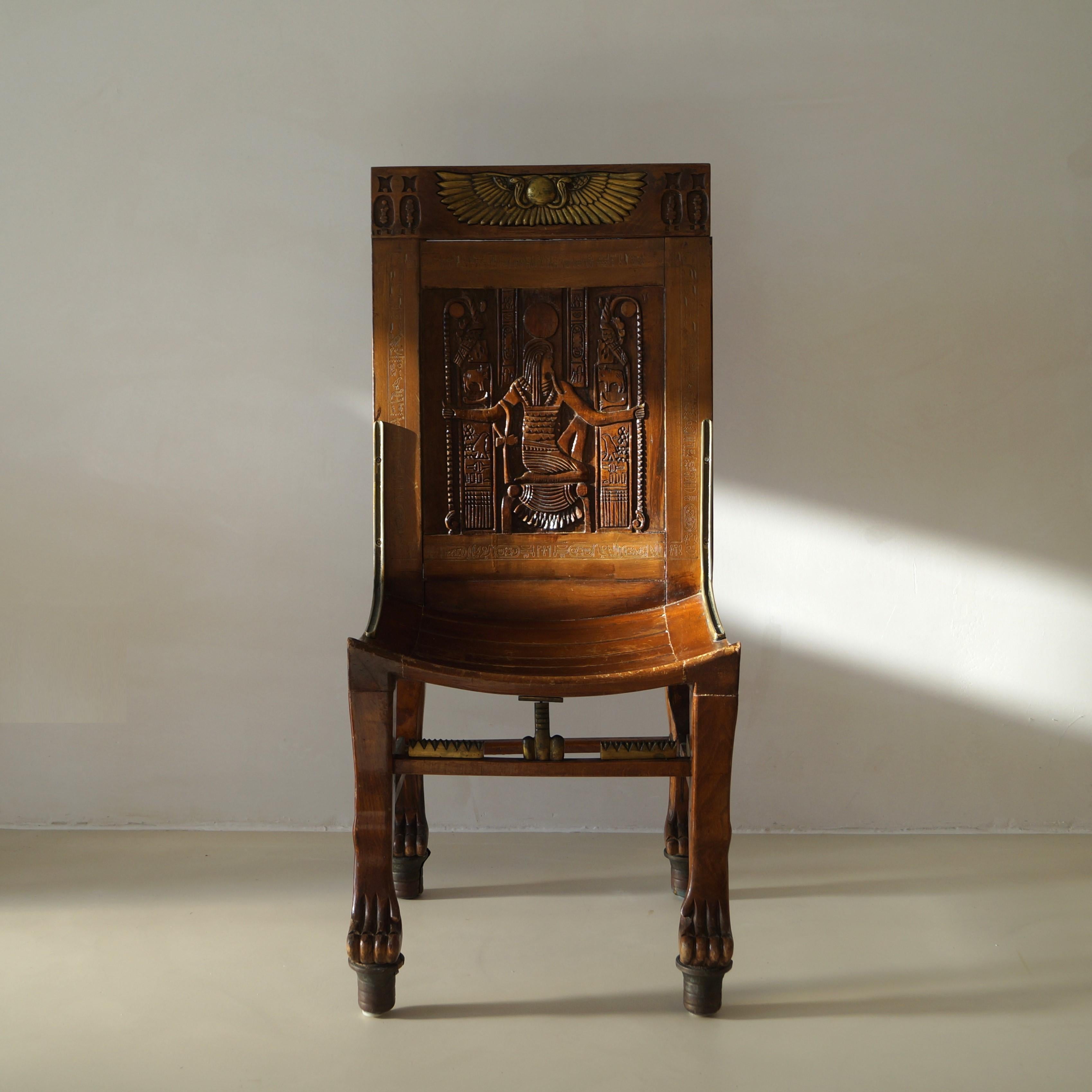 Carved Vintage Egyptian Revival chair inspired on Tutankhamun's tomb chair, c. 1955 For Sale