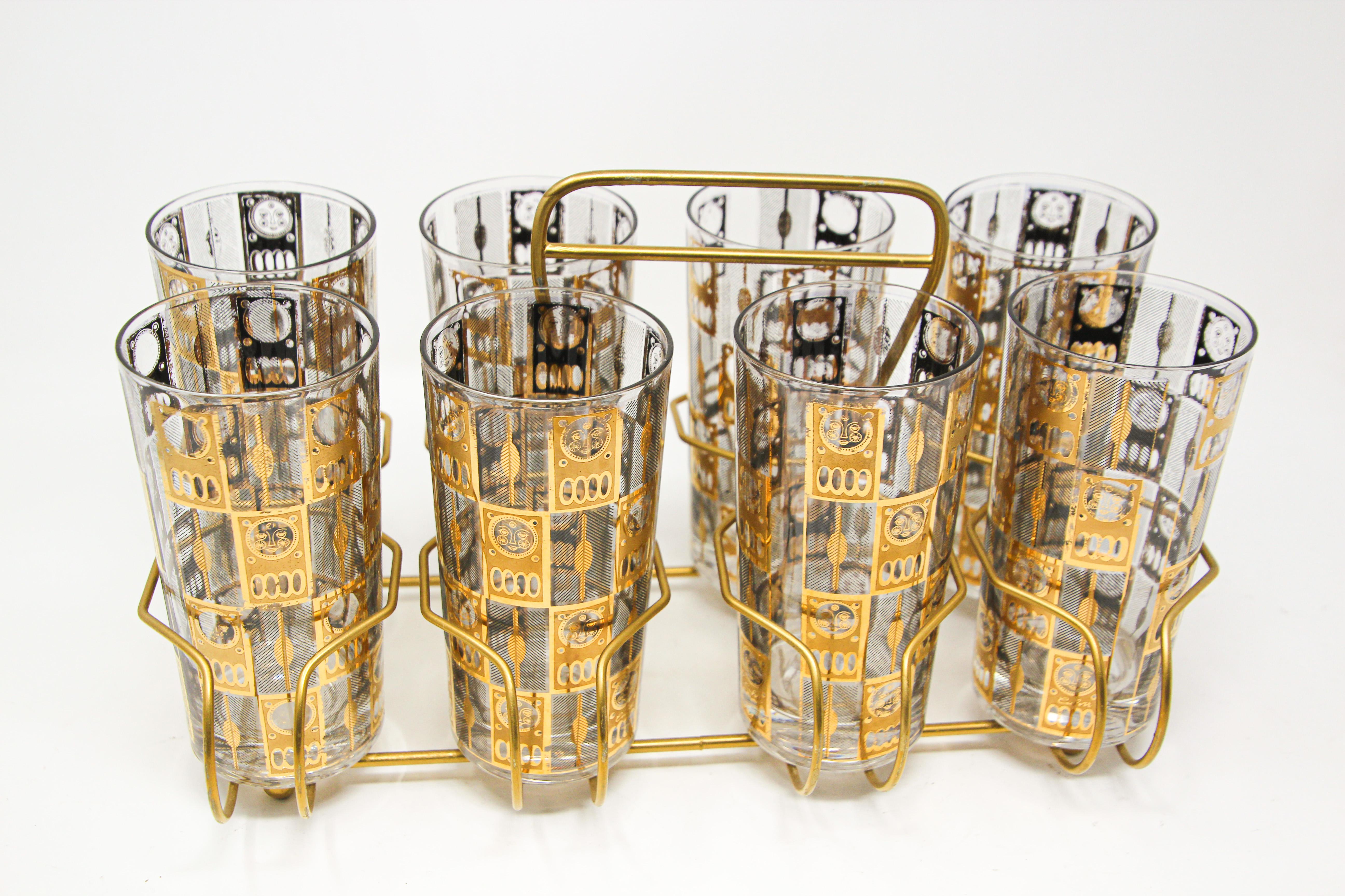 Elegant exquisite vintage set of 8 Collins glasses by George Culver.
Set includes 8 highball glasses in a polished brass cart with handle.
The glasses are decorated with gold design.
Perfect vintage condition, with 22-karat gold leaf design like