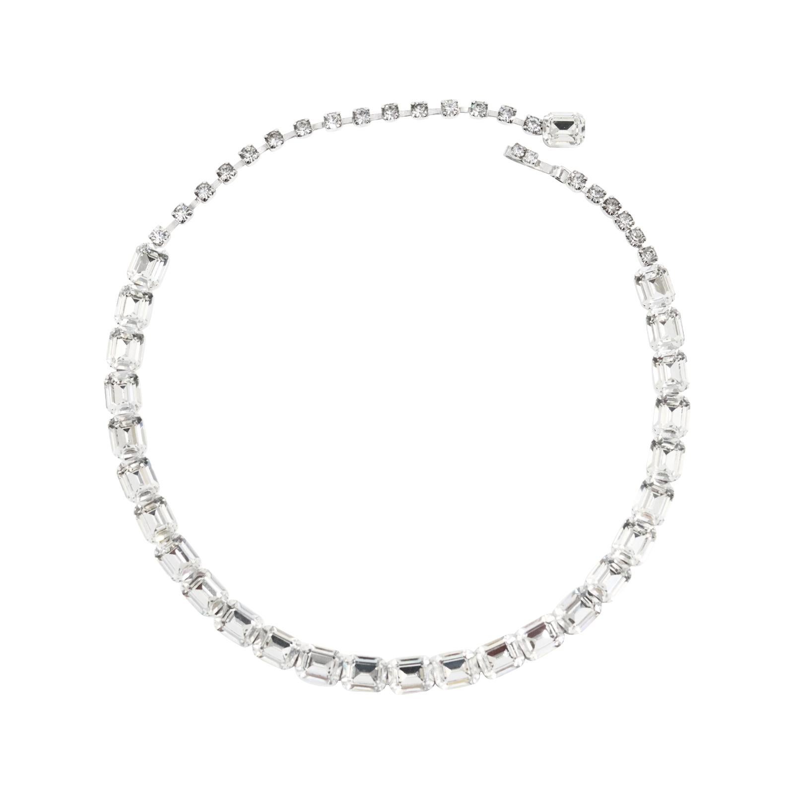 Vintage Diamante Emerald Cut Choker, Circa 1980s. This is a cool piece, but it lacks curb appeal until you see it in person. Then it comes alive. It's a smaller and thinner piece with sideways emerald cuts. This is chic at its best! 

Substantial