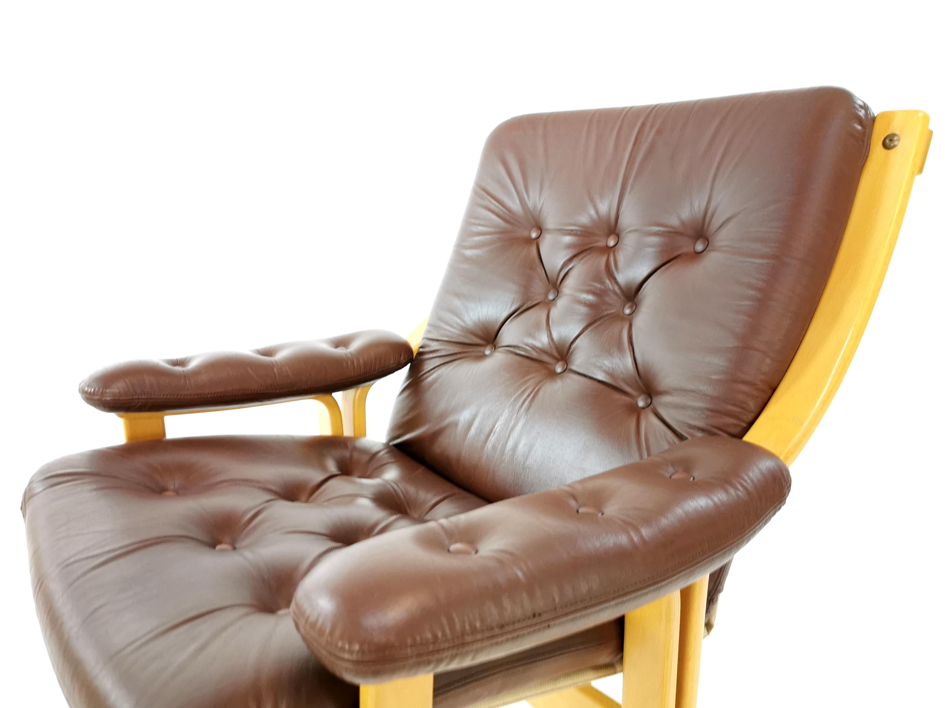 Ekornes leather armchair.
Ekornes are principally known for its luxury line of armchairs and sofas.
Norwegian, circa 1970s. Made with leather and bentwood.