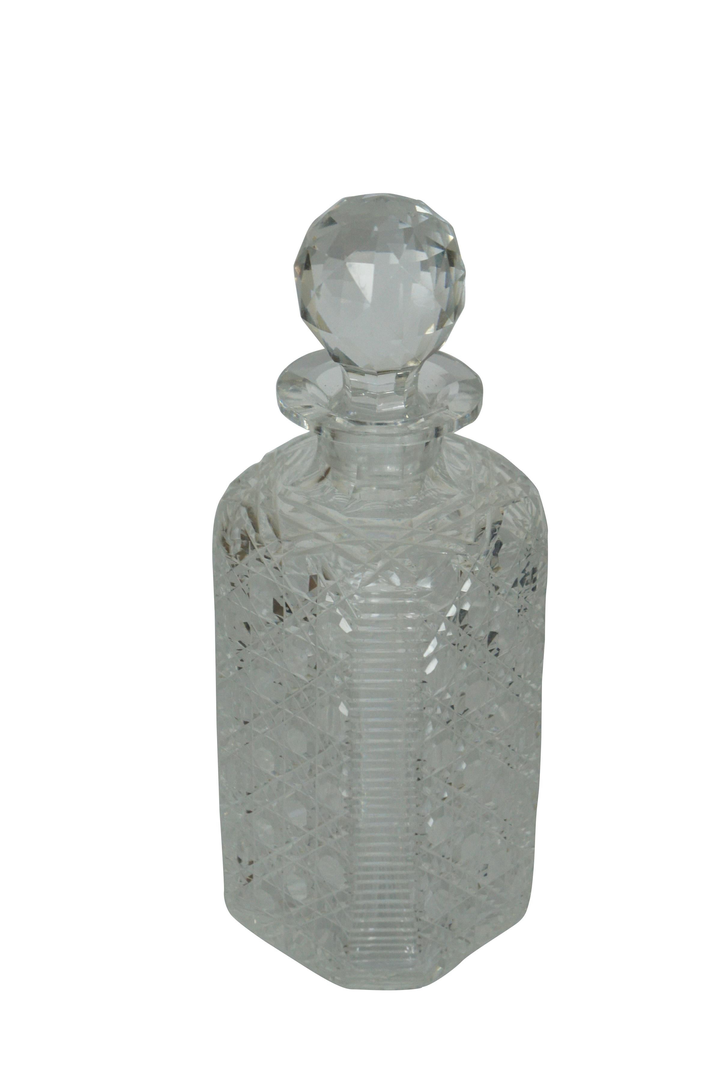 20th century Edinburgh & Leith cut crystal decanter / bottle, square body with clipped corners, cut with an intricate cross hatched pattern and faceted orb stopper.

Dimensions:
3.5