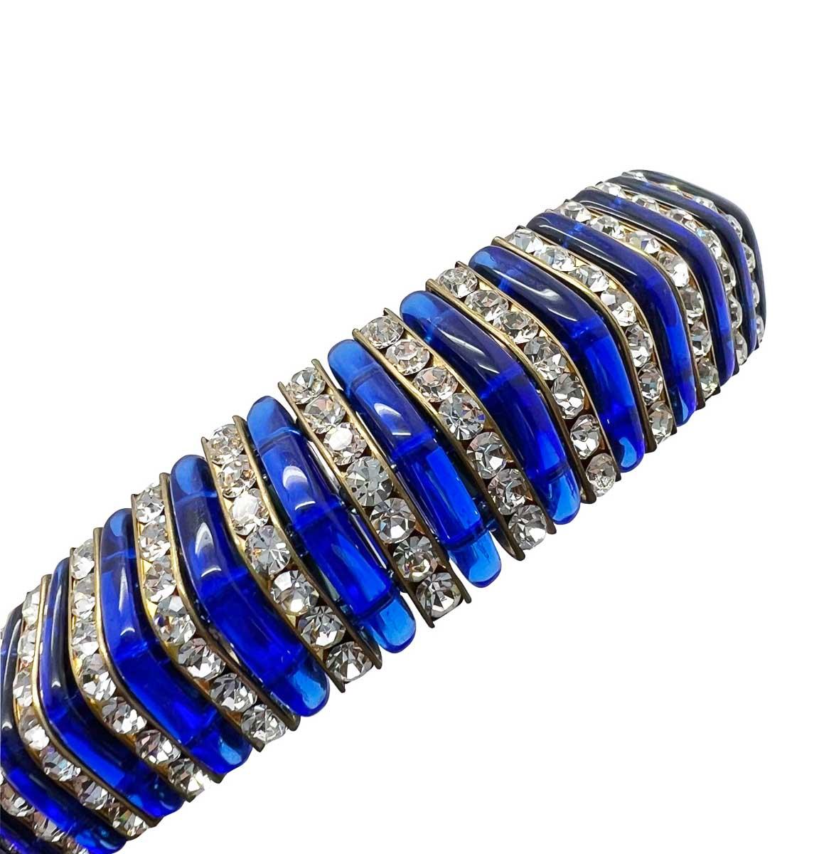 A rare and superb Vintage Electric Blue Glass Choker featuring incredible poured glass detail. Incorporating electrifying blue poured glass, alongside paste galleries in a pyramid effect design. The electric blue glass is deliciously vibrant and the