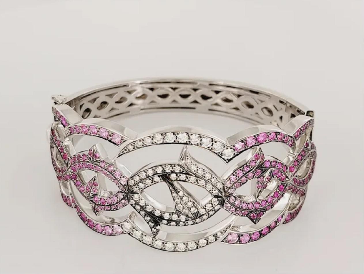Stephen Webster Thorn Hinged cuff bracelet with white and pink diamonds. Part of the thorn collection, which celebrates an ancient symbol for pleasure and pain. Set in 18K White gold, 53.2 grams. Retail Price $22,500.