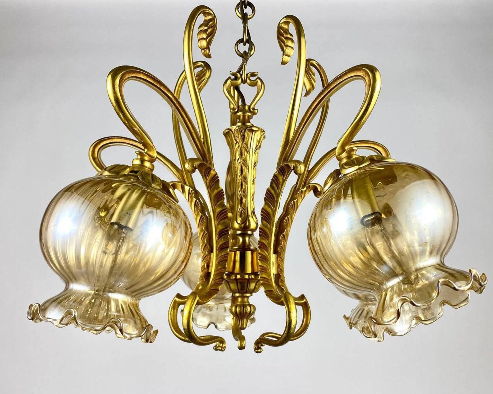 Large vintage graceful chandelier of classical style from the Belgium Manufactory. Circa 1980s. 

Beautiful chandelier with 5 light points is the quality in every detail of the lighting fixture. 

The gilt brass fittings look solid and glass