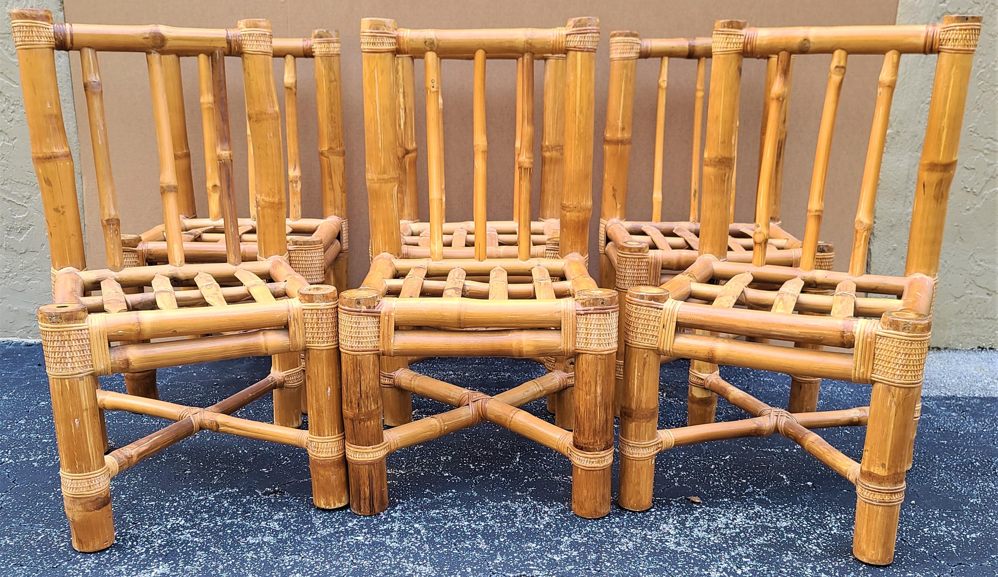Offering one of our recent Palm Beach Estate fine furniture acquisitions of a
Set of (6) vintage elephant bamboo rattan wicker dining chairs with cushions by HEINSA
The 100% cotton cushion covers have zippers so they are washable.

Approximate