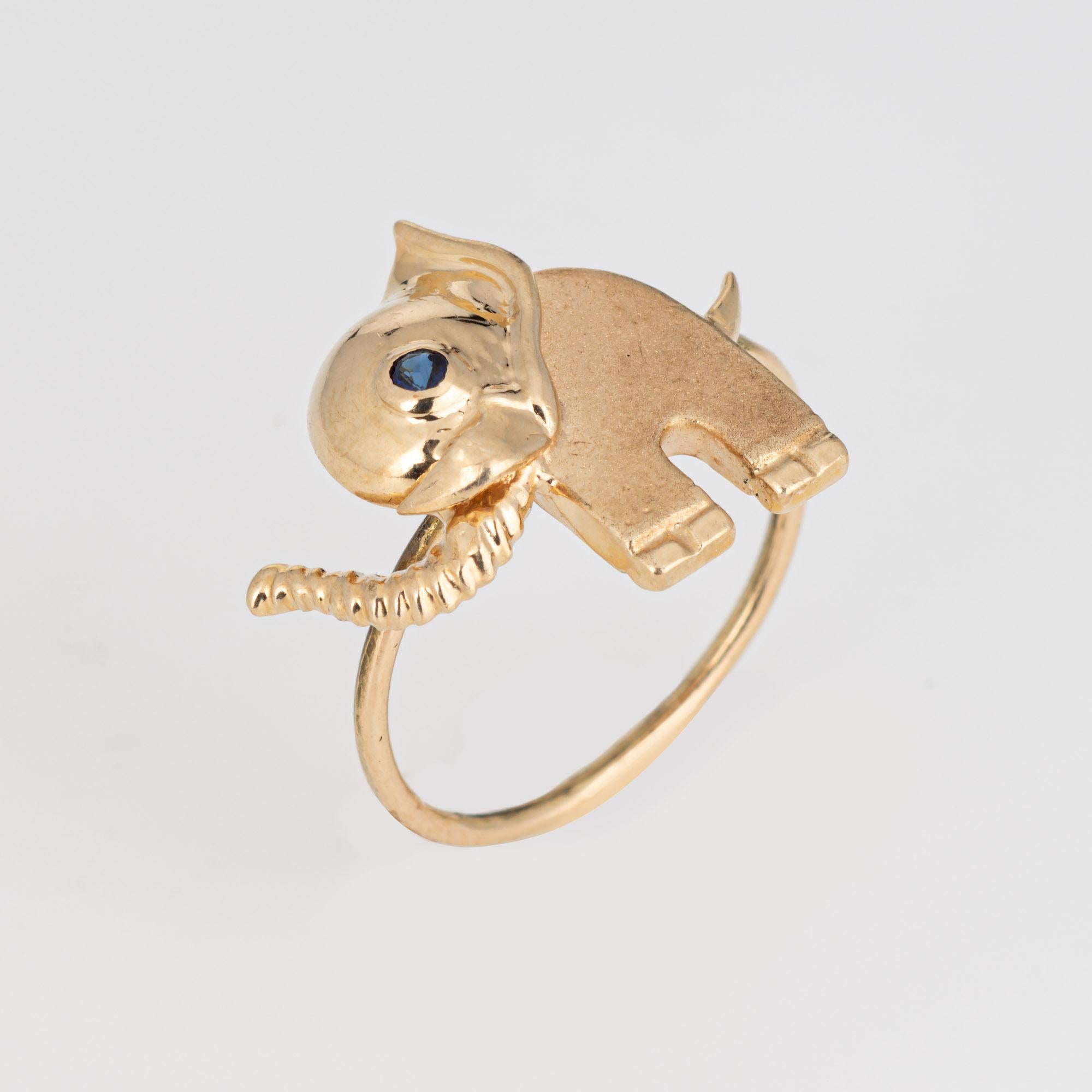 Originally a vintage stick pin the Elephant ring is crafted in 14 karat yellow gold.

The ring is mounted with the original stick pin. Our jeweler rounded the stick pin into a slim band for the finger. The beautifully detailed ring features a