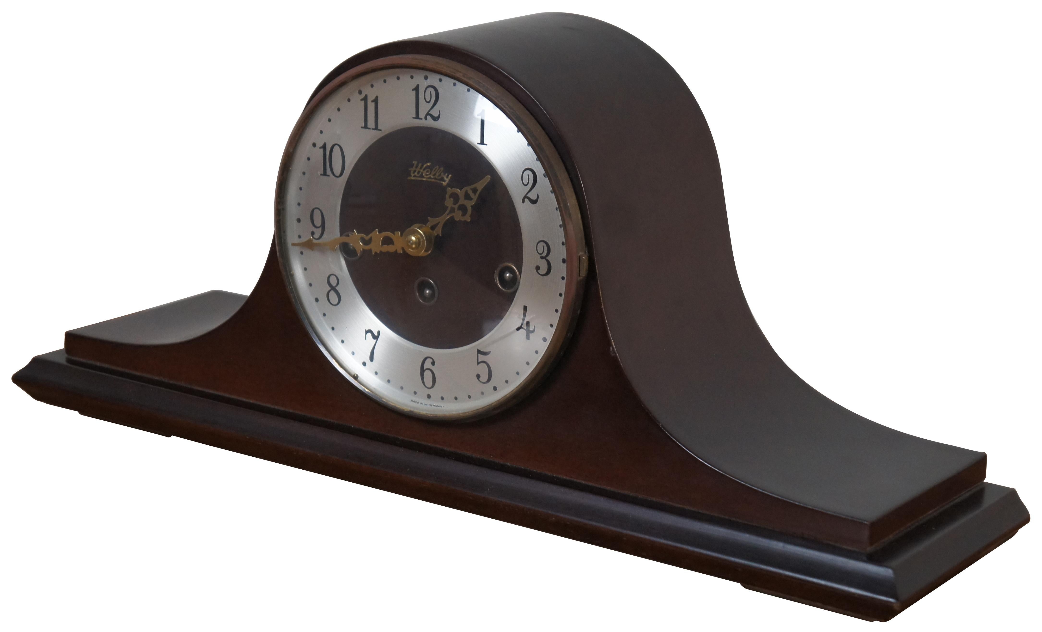 Vintage mahogany humpback chiming mantel clock by Welby (a division of Elgin) with Franz Hermle Two Jewel Unadjusted works, number 340-020. Measure: 18