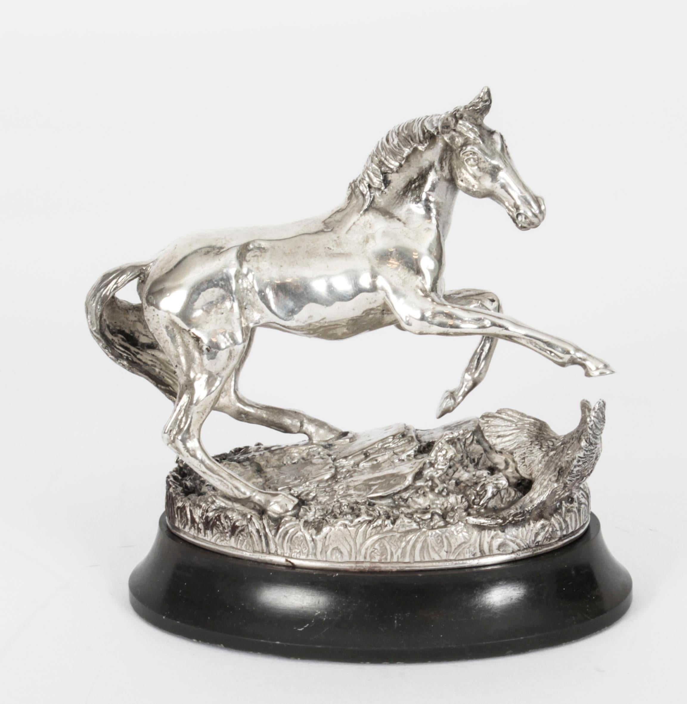 This is a remarkable Elizabeth II cast sterling silver limited edition model of a horse standing on an oval ebonised base, 1977 in date. 

This truly splendid and excellently executed miniature figure of a horse bears the full sponsors marks of the