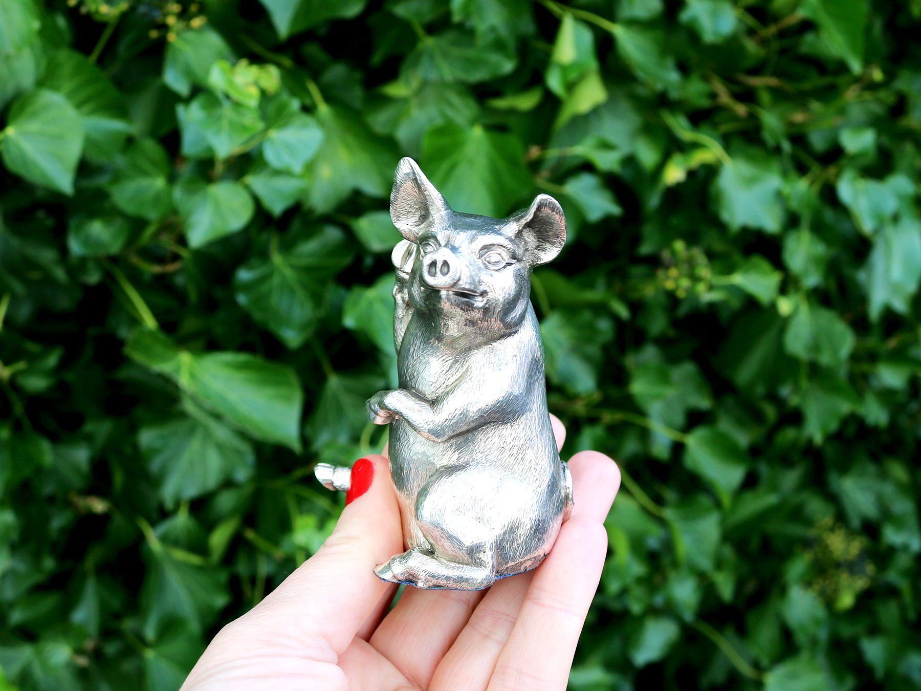 An exceptional, fine and impressive vintage cast English sterling silver paperweight/model of a pig; part of our animal related silverware collection.

This exceptional, fine and impressive vintage sterling silver pig ornament/paper weight has