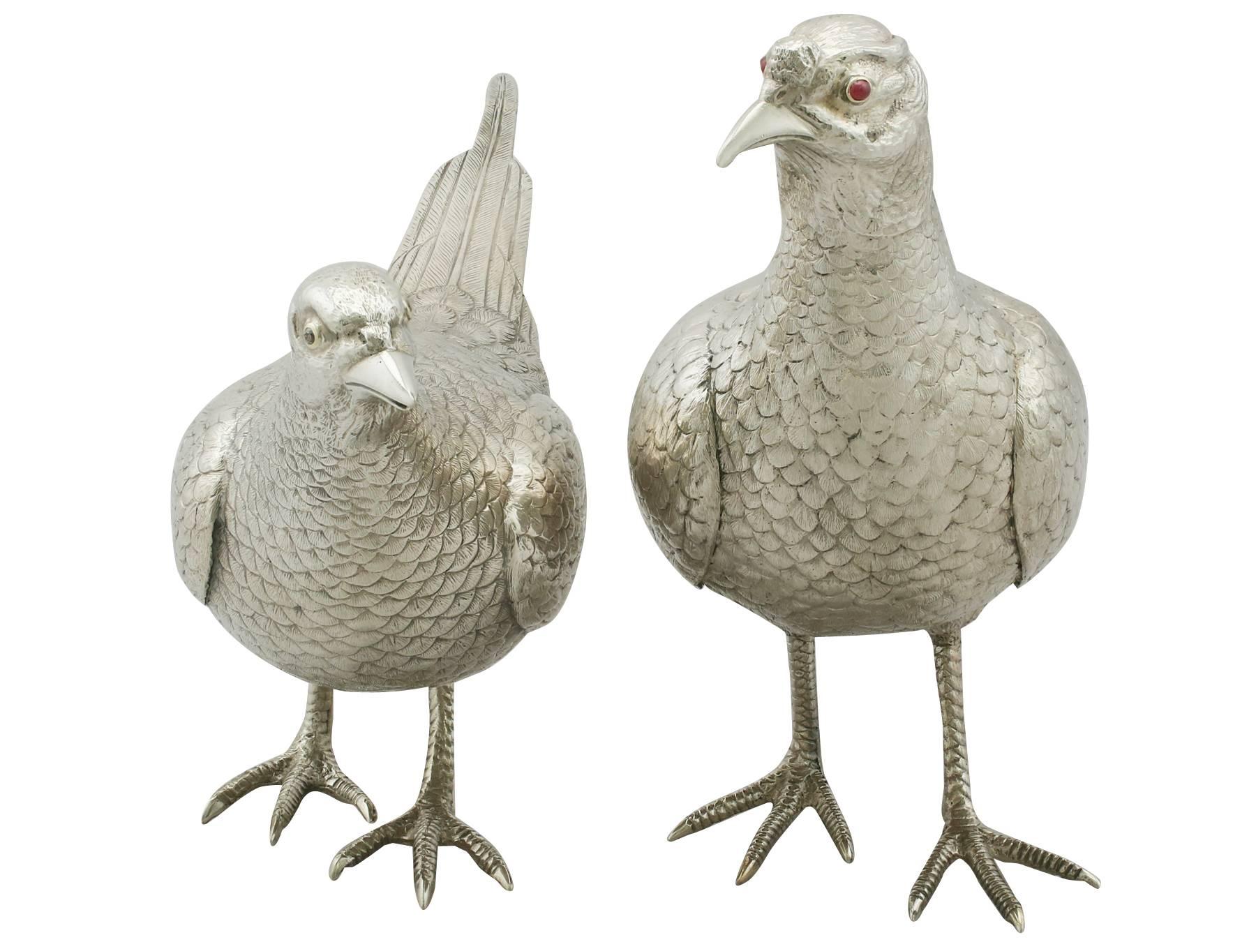An exceptional, fine and impressive pair of vintage English sterling silver table pheasants; part of our ornamental silverware collection

These exceptional vintage cast sterling silver table ornaments have been realistically modelled in the form