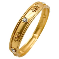 Brazalete vintage Elizabeth Taylor Corazones de cristal para el brazo Años 80