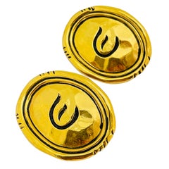 Vintage ELIZABETH TAYLOR for AVON gold designer runway clip on earrings