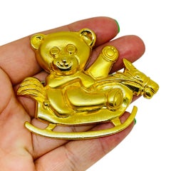 Vintage ELLE signed gold tone teddy bear rocking horse designer brooch