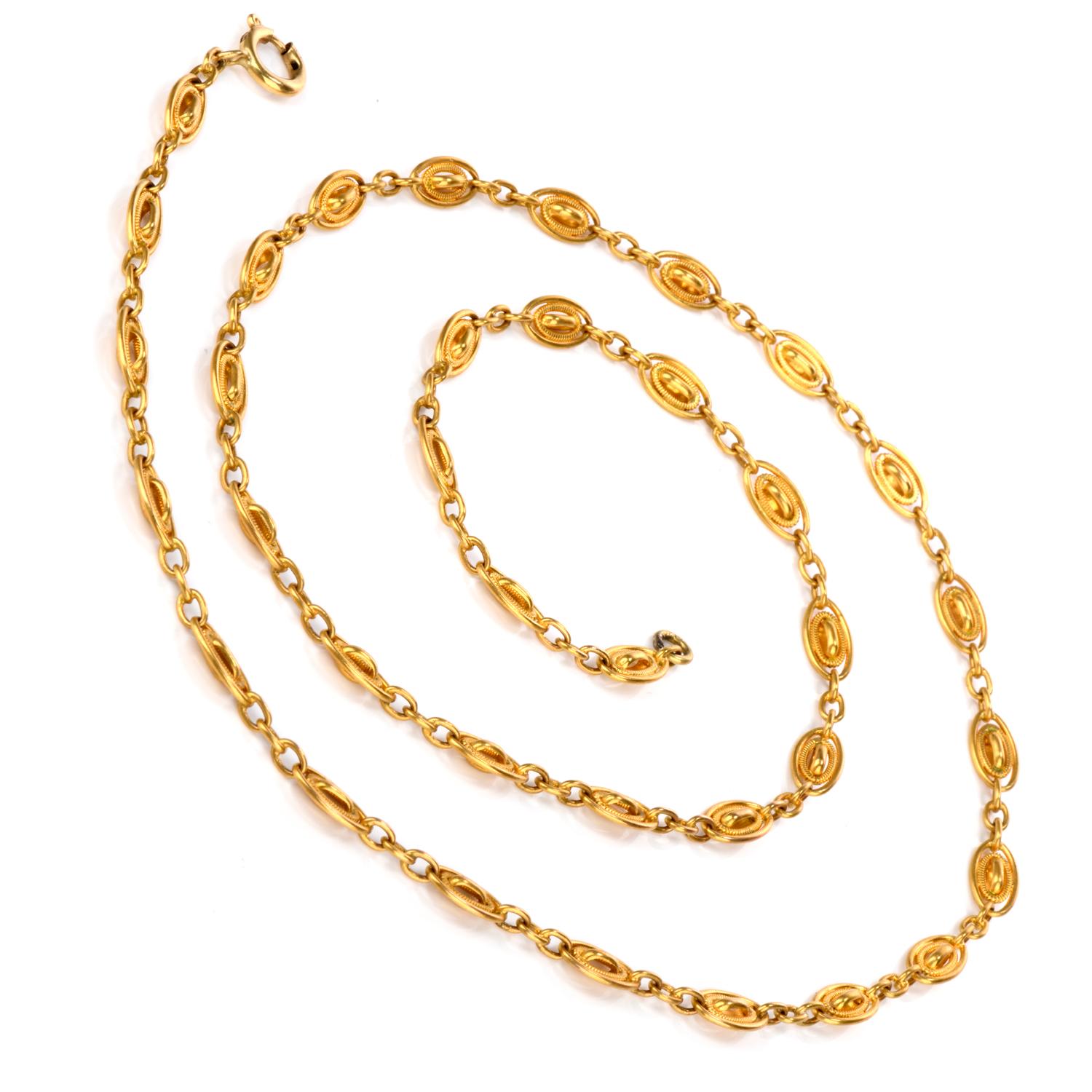 This fun loving Antique Chain Necklace was inspired in an Elliptical Sphere motif 

crafted in 18K gold. Draping down the neckline is 26 inches of gold links.

Measuring 6.35mm x 26 Inches.
Weighing appx. 30.8 Grams.
Excellent Condition.