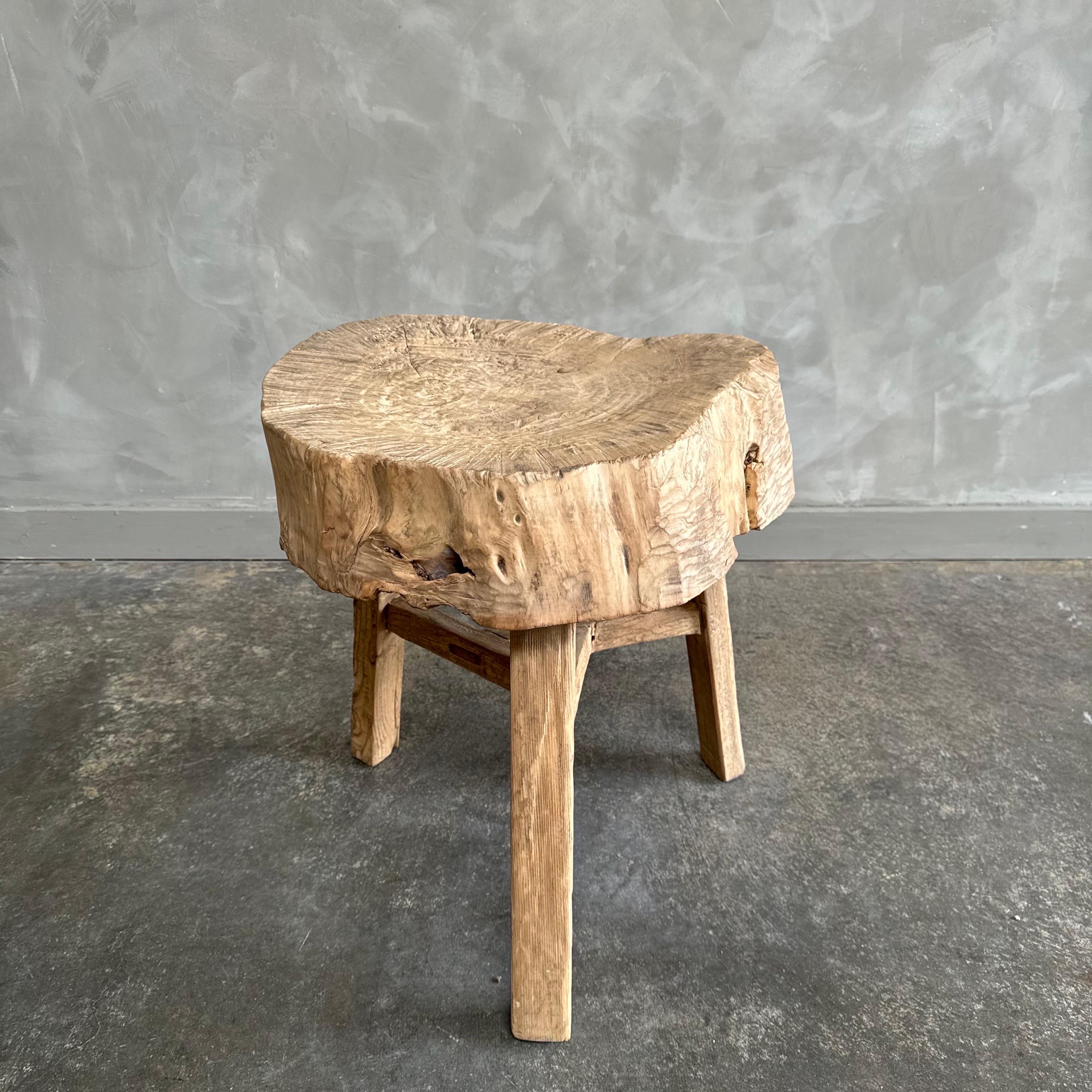 This solid stump slice was turned into a side table or stool. The solid thick top has a beautiful movement with unique characteristics. A natural live edge to show shape and form of what was. Solid and sturdy, perfect earthy organic piece to add to