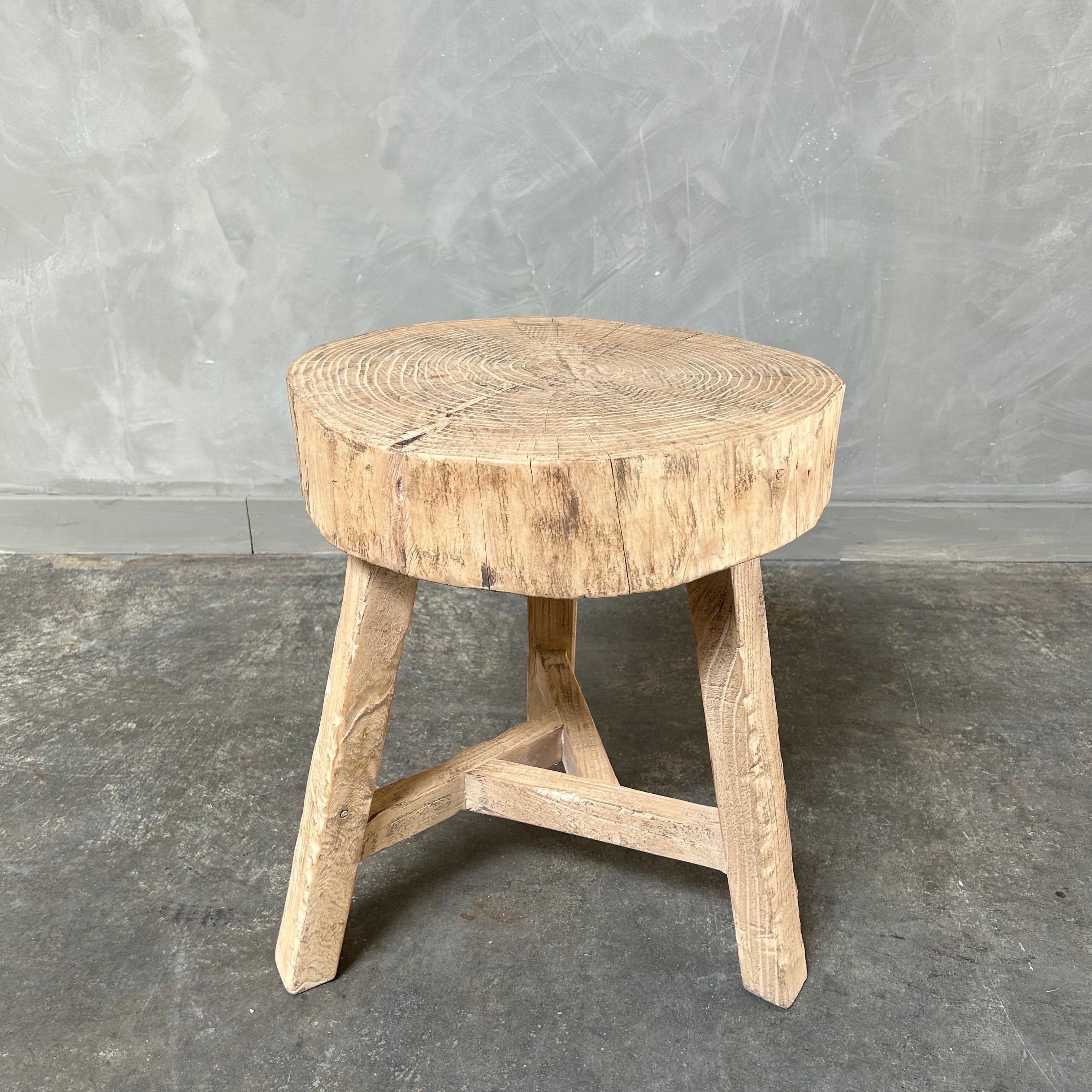 This solid stump slice was turned into a side table or stool. The solid thick top has a beautiful movement with unique characteristics. A natural live edge to show shape and form of what was. Solid and sturdy, perfect earthy organic piece to add to