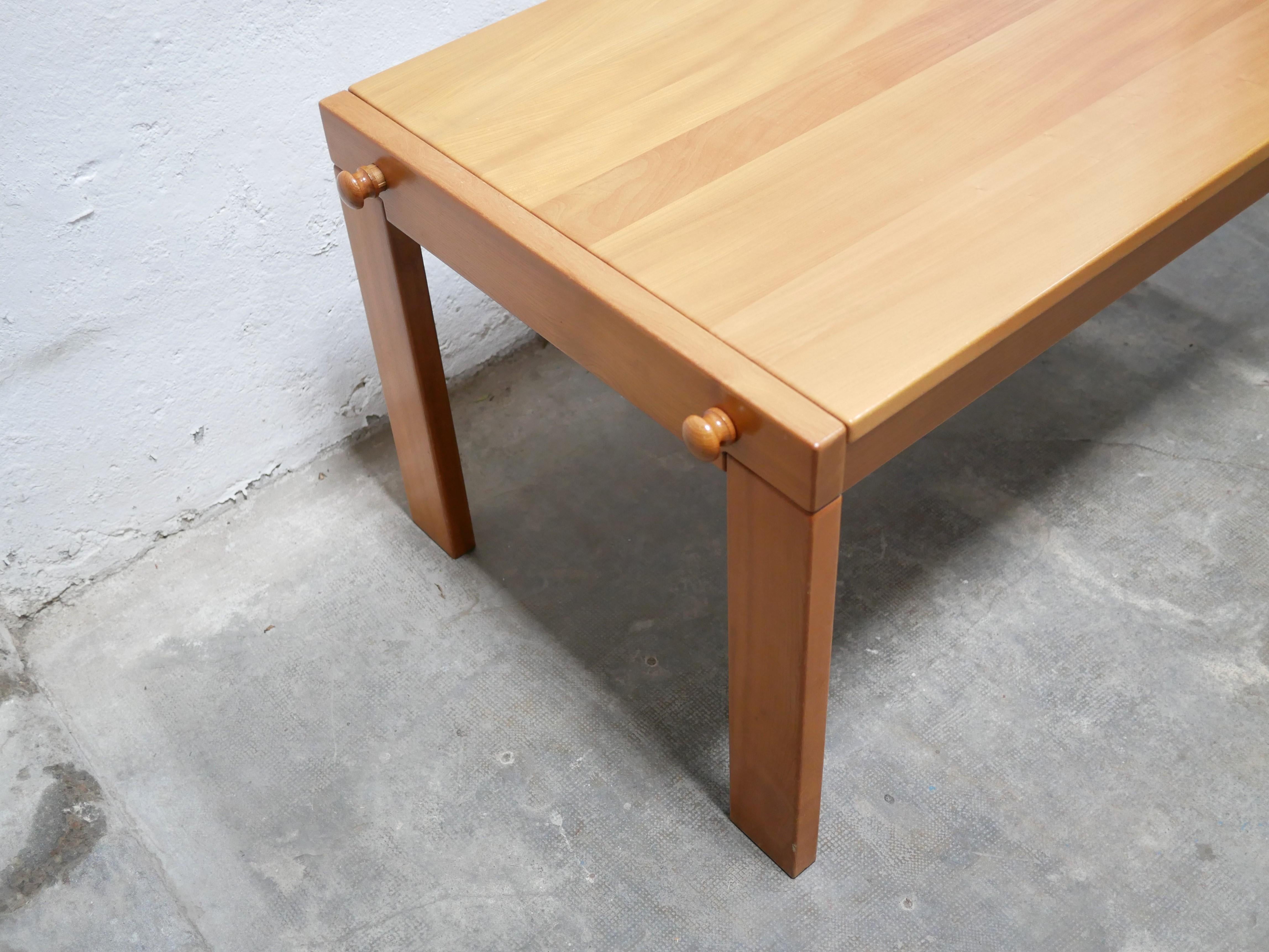 Solid elm table produced by Maison Regain in the 1980s.

The bright, warm color of the wood and its simple, clean lines give it a lot of character and elegance. We love its design, its precious wood and its manufacturing quality.

Timeless, it will