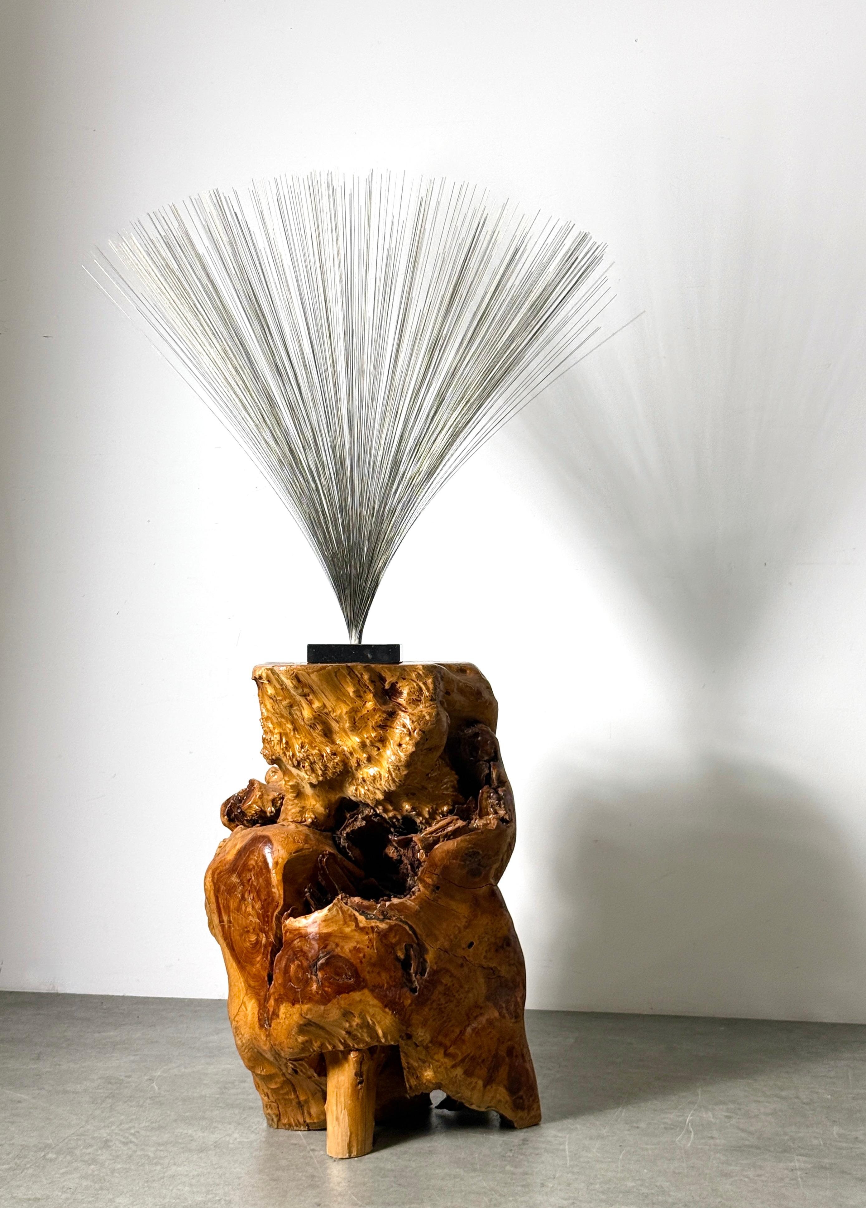 Sculptural elm burl root form pedestal table or stand circa 1970's

Formed from a single massive root section showing natural crevices and knotted burls 

Sculptural in its irregularity with a smoothly leveled surface for use as a pedestal, stool or