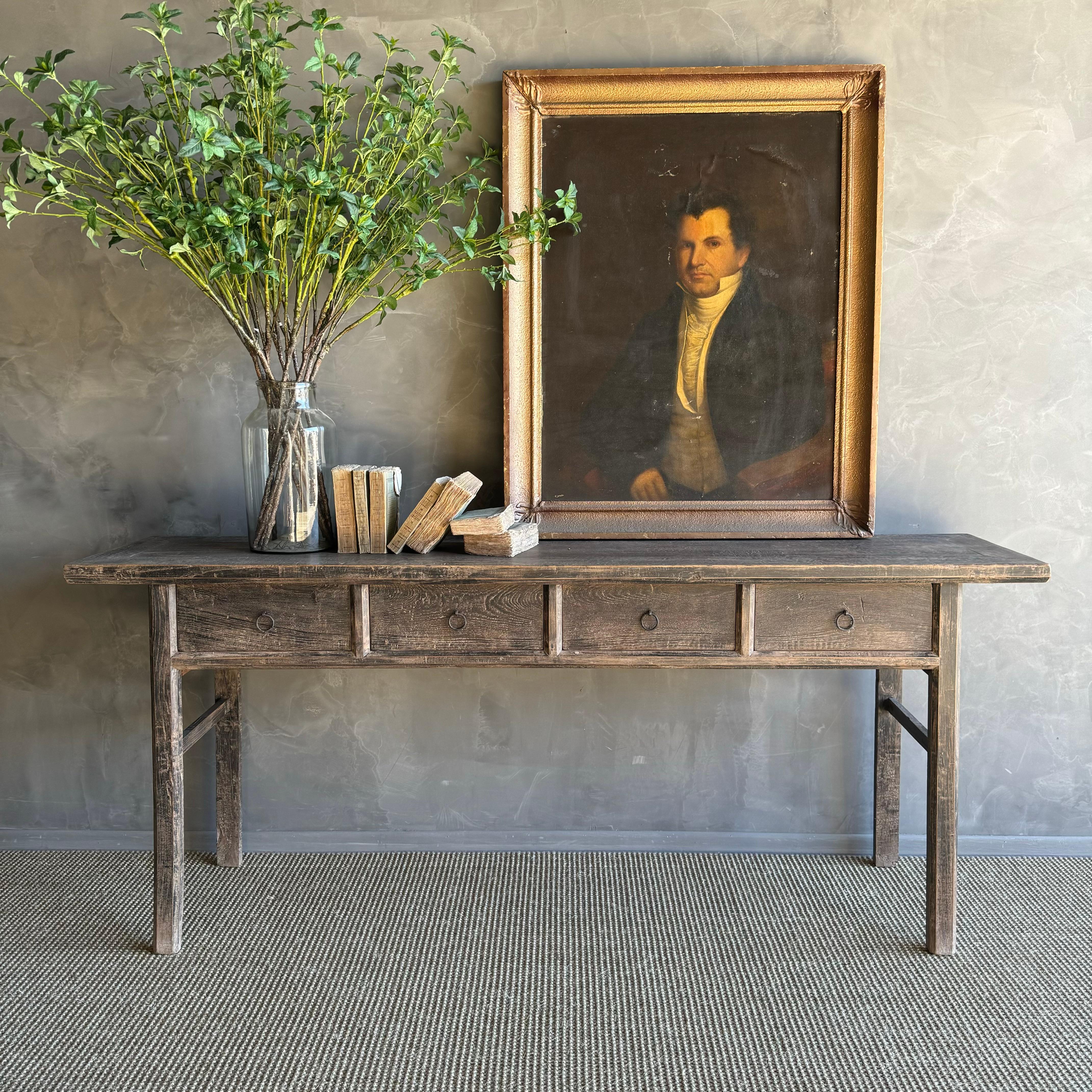 Transform your space with the charm of an antique elm wood painted console with drawers. This piece boasts original patina, ideal for a mountain house, beach house, or lake house aesthetic. Embrace the wabi sabi look with its weathered finish,