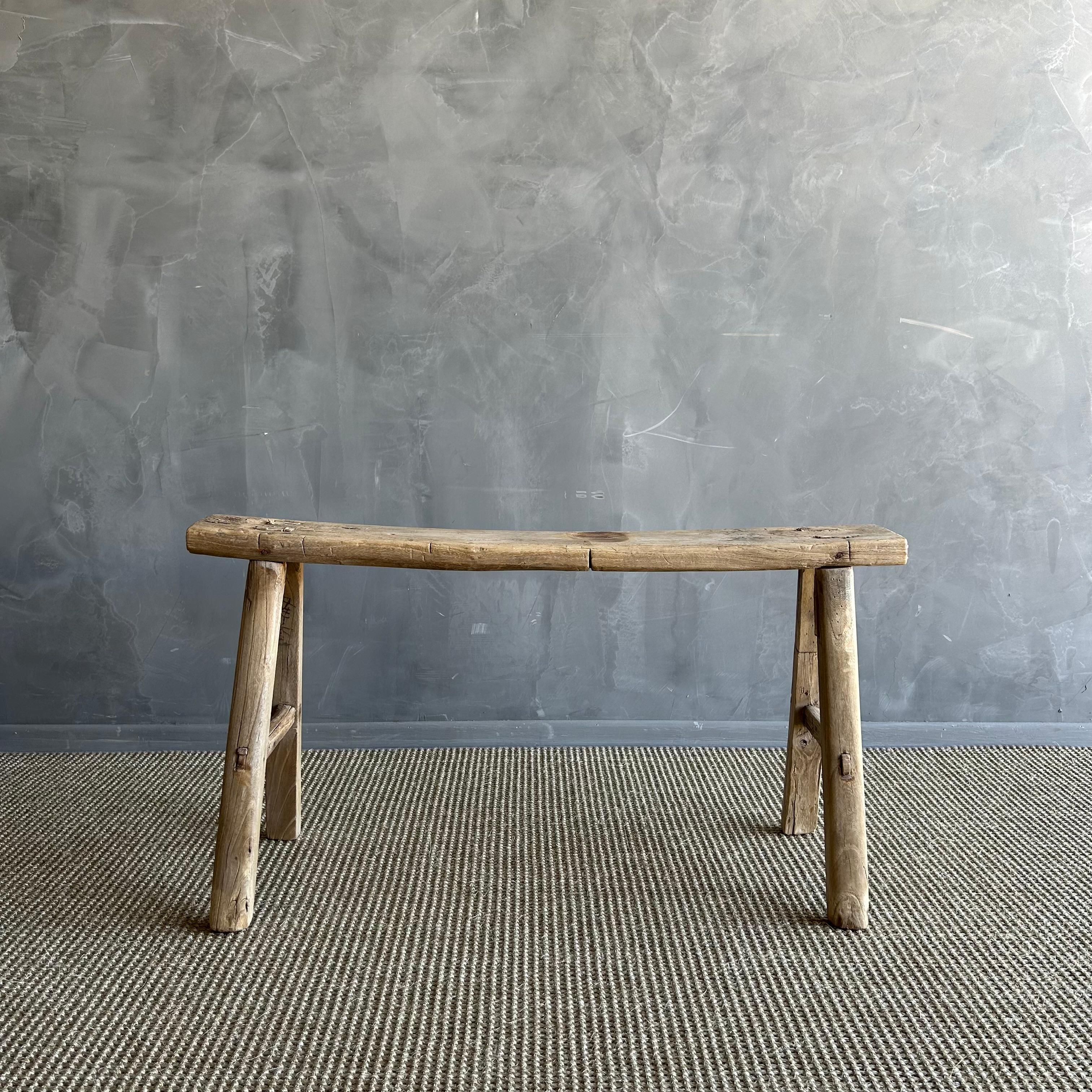 Vintage elm skinny bench.
Crafted from reclaimed elm wood, this bench is not only solid and sturdy but also exudes a charming rustic charm. Perfect for adding character to any room, this bench is ideal for placing at the end of a bed, in the