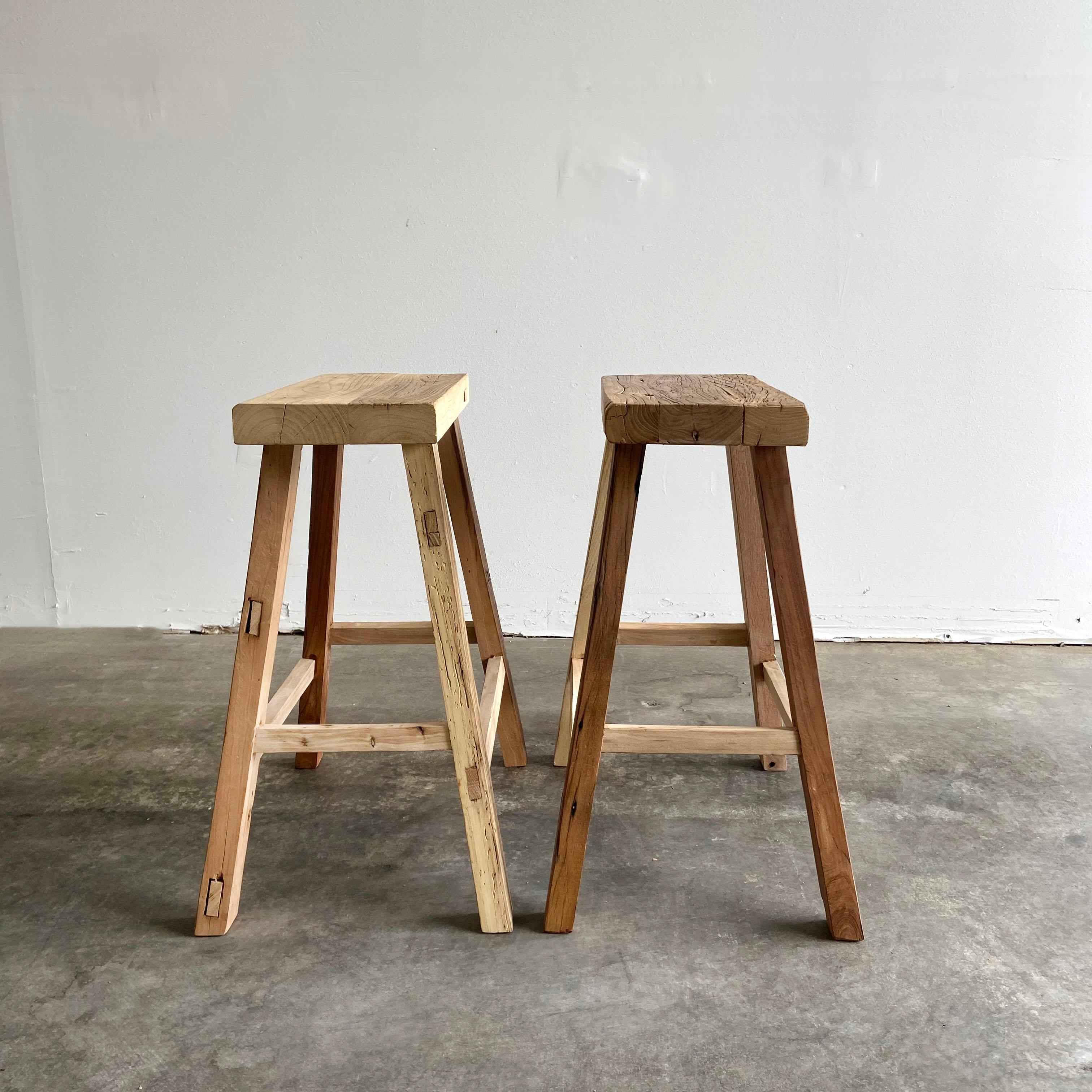 Vintage antique elm wood stool or pedestal
These are reclaimed elm wood stools! Beautiful antique patina, with weathering and age, these are solid and sturdy ready for daily use, use as a table, stool, drink table, they are great for any space.