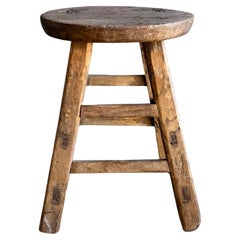 Tabouret vintage en bois d'orme rond