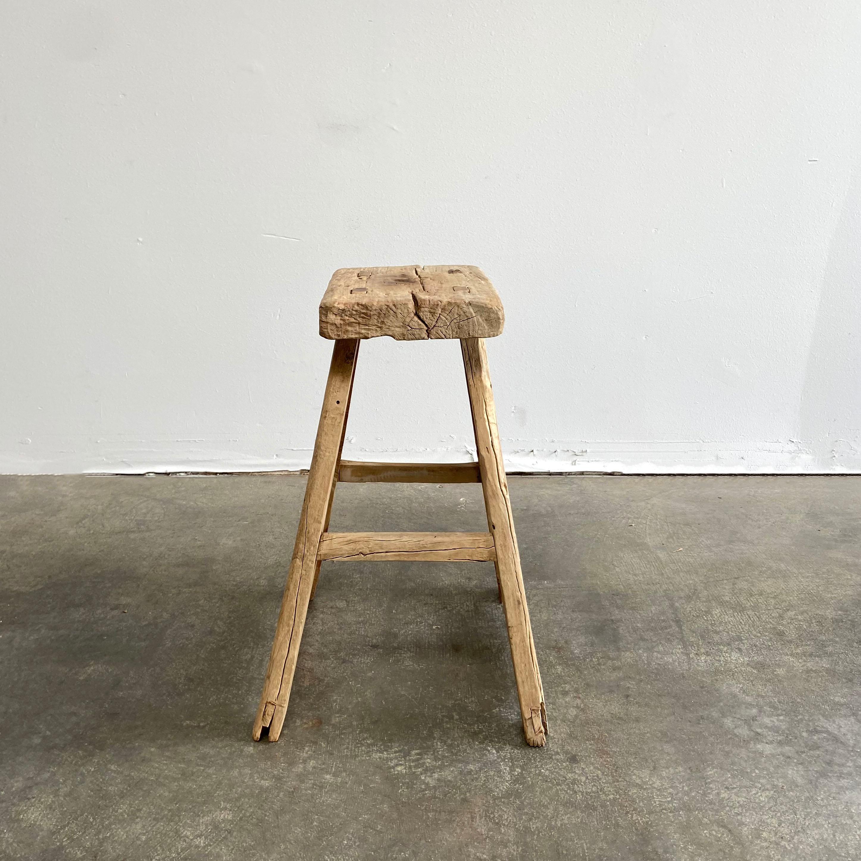 Vintage elm wood tall stool or pedestal side table.
Measures: 18” W x 16” D x 24.5