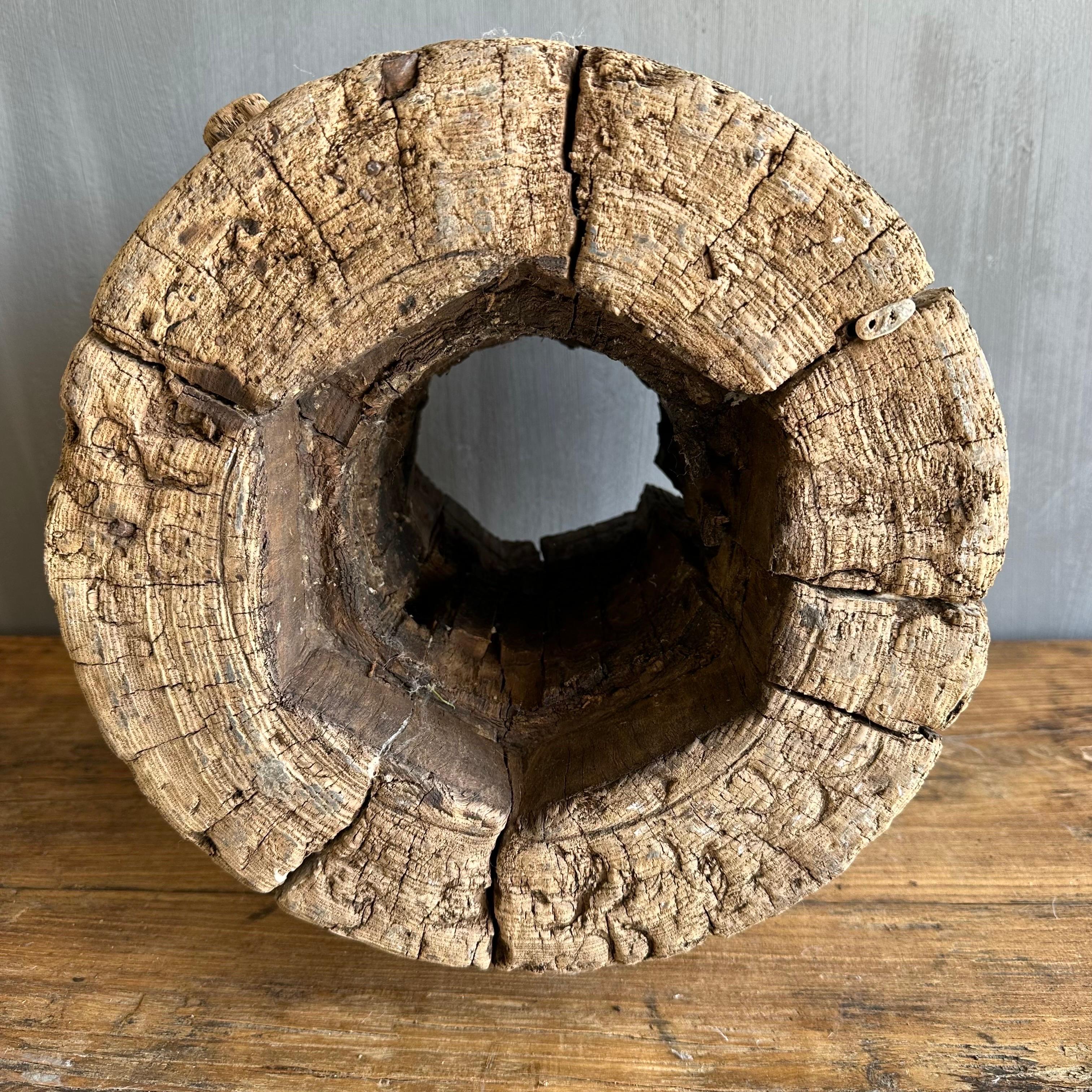 Vintage Elm wood wheel 
Great as an accent piece for a bookshelf or side table.
Size: 15”d x 11”h
