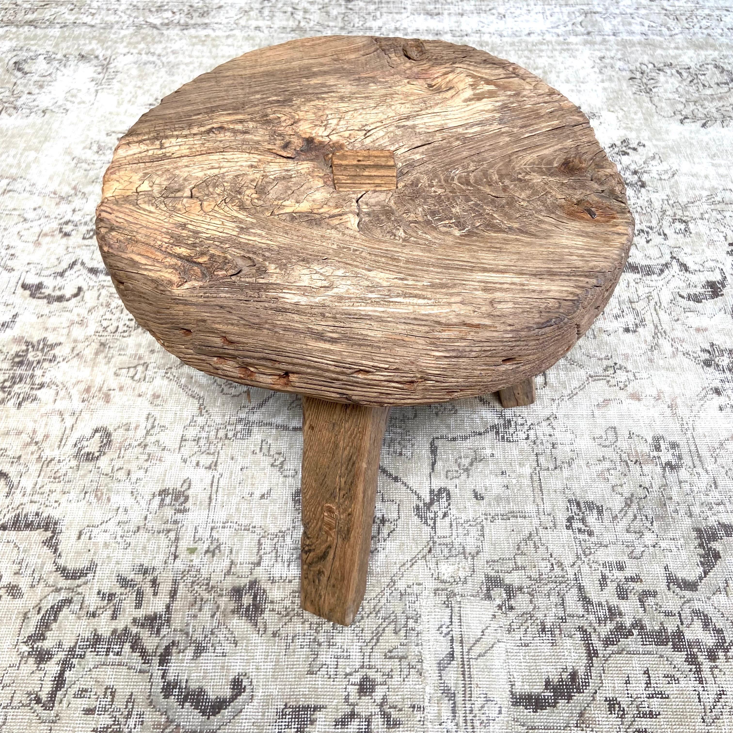 Elm wheel side table 19”rd. X 18”h
Antique wheel side table. This vintage elm wood wheel table is finished with medium to dark stain. The table is solid and sturdy ready for everyday use. Use as a side table, stool, powder room to add vintage style